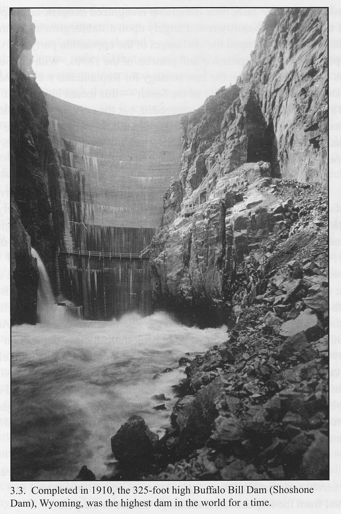 Black and white photo of Shoshone Dam, showing water flowing down
