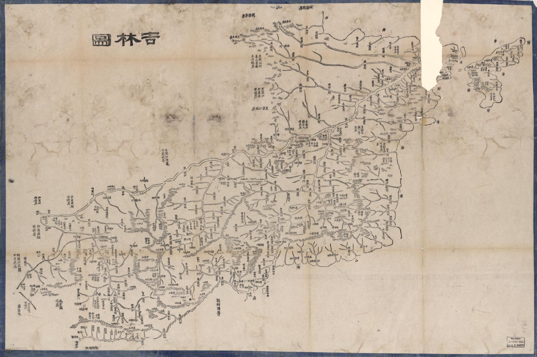 Chinese-language woodblock print map with a tear in the paper in the upper right corner