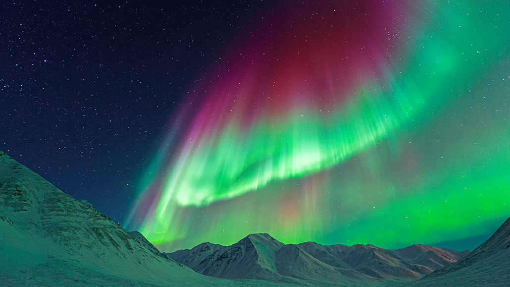 Red and Green Aurora Move Through Earth’s Atmosphere