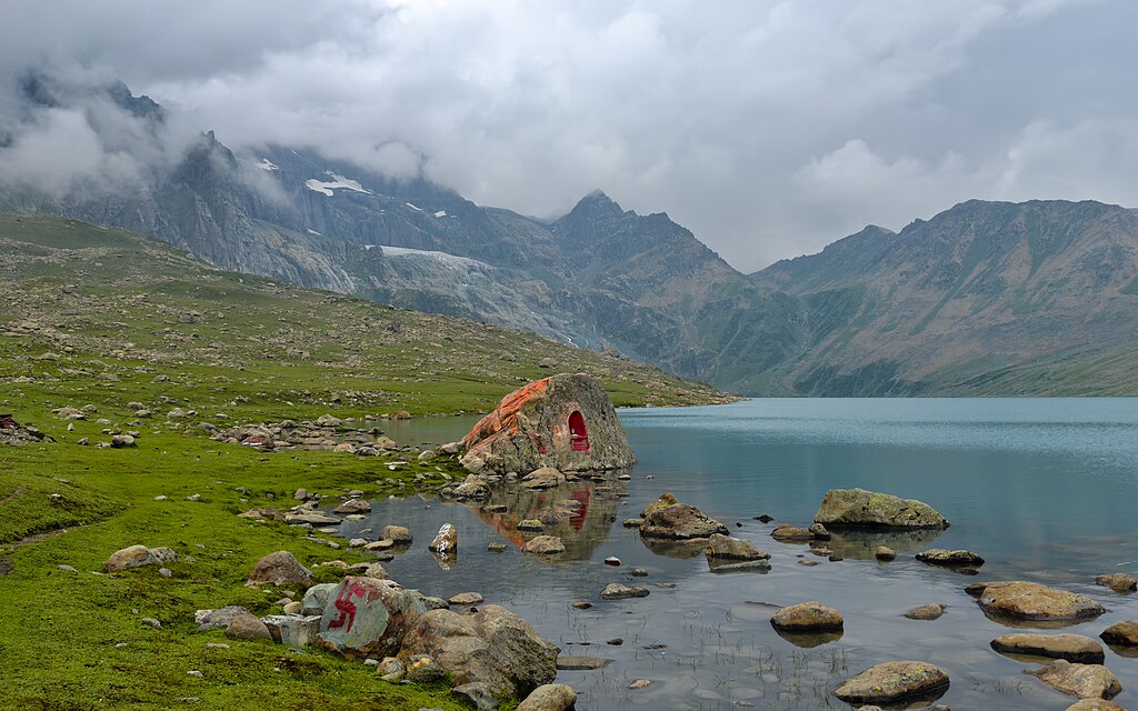 Picture of the day





Shrine dedicated to Shiva situated at the shore of the Gangabal Lake, a high altitude glacial lake in the Indian Himalayas. The lake is situated at the foot of Mount Haramukh in Jammu and Kashmir, and is called Gangabal meaning ‘place of Ganga’ in Kashmiri language. It is considered sacred in Hinduism as an abode of Shiva and used by Kashmiri Hindus to immerse the ashes of their dead after cremation. It has been described as a place of pilgrimage in several ancient Hindu texts and an annual Hindu pilgrimage to the lake starts from a nearby 8th century Shiva temple. This picture was taken in the month of Shravan, the fifth month of the Hindu calendar, which is dedicated to the worship of Shiva.
 #ImageOfTheDay