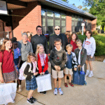Band helps Assumption School welcome students on first day