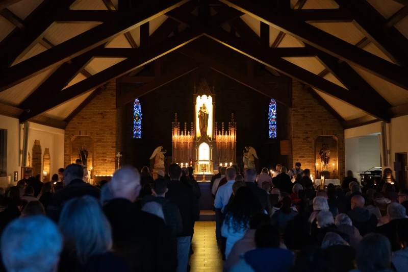 Ancient Advent Mass gains new interest among younger Catholics #Catholic 
 
 The Rorate Caeli Advent Mass celebrated at The National Shrine of Our Lady of Champion. / Credit: The National Shrine of Our Lady of Champion

CNA Staff, Dec 14, 2025 / 06:00 am (CNA).
Advent is a season filled with rich Catholic traditions, but a slightly lesser-known one is growing in popularity among younger Catholics. The ancient liturgy of the Rorate Caeli Advent Mass honors the Blessed Virgin Mary through a Mass celebrated at dawn, in complete darkness, and lit only by candles, which symbolizes Christ, the Light of the World, entering into the world with Mary as the vessel.&nbsp;Emerging in the Middle Ages, the Rorate Caeli Mass gets its name from the prophecy of Isaiah. Rorate Caeli is Latin for “drop down, ye heavens.” These are the opening words of this liturgy’s Introit, which is used as an opening psalm or entrance antiphon and comes from Isaiah 45:8.Father Tony Stephens, rector at the National Shrine of Our Lady of Champion in Champion, Wisconsin, calls this Mass “a teachable moment.”“As all of us are gathered in the church, only lit with the candles, slowly the light begins coming in through the windows and it’s like the light of Christ,” he told CNA. The process symbolizes “the light of Christ coming into our lives, slowly but surely and progressively as we go through life.”“And just like that light begins to come in through the windows, as the physical sun rises, so in our journey as Catholics, the closer we get to Christ, the more his light shines in our life,” he said. Fr. Nathaneal Mudd, CPM, celebrates the Rorate Caeli Advent Mass at the National Shrine of Our Lady of Champion in 2024. Credit: The National Shrine of Our Lady of ChampionStephens has been rector of the National Shrine of Our Lady of Champion for two years but was scheduled to celebrate the Rorate Caeli Mass there for the first time on Dec. 13. The shrine is the first and only approved Marian apparition site in the United States. It was here that the Blessed Mother is believed to have appeared to Adele Brise in 1859.&nbsp;When speaking about the Blessed Mother’s role in Advent, Stephens described it as “a season of anticipating Our Lord, but when you look at the subtext of Advent, things about Mary are everywhere — in the readings and her role in salvation history is so important. And so that’s, again, part of the reason you have these special Marian Masses honoring her during this Advent season.”He also highlighted the fact that this ancient Mass is seeing a resurgence in popularity and credited Pope Benedict XVI, in part, for reintroducing Catholics to older, traditional practices and his “desire of the hermeneutic of continuity.”&nbsp;“He in his pontificate really emphasized a desire to have that continuity between the earlier traditions of the Church, even prior to the [Vatican II] council … looking at all of the rich liturgical heritage that we have as Catholics,” he added.&nbsp;The priest pointed out that young people are also searching for more traditional practices.“There is a great love, especially amongst young people, for things that are traditional,” he said, adding that the Mass also “appeals to the senses in a way that technology and phones don’t.”&nbsp;“The real light of a candle is way different than the electronic light put off by a cellphone screen,” he said. “A burning, living candle, the way it flickers, and you can’t recharge a candle — it gives everything it has like Jesus did on the cross. A candle burns with all its might to put off that light. And so there is a selflessness about that light of that candle that’s different than technology, and young people desire that kind of self-gift and authenticity.”Stephens said he hopes those who attend a Rorate Caeli Mass will leave with “an eager anticipation of Jesus coming at Christmastime.”“A Rorate Caeli Mass is one of those times that we can have a little consolation and we’re reminded of the author of all consolation and his mother,” he said.