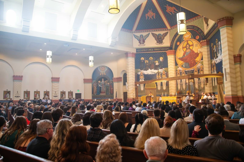 College campus ministries register remarkable growth in baptisms, confirmations #Catholic 
 
 Mass at Arizona State University’s Newman Center chapel. / Credit: Photo courtesy of Father Bill Clements, director of ASU Newman Center

Ann Arbor, Michigan, Dec 15, 2025 / 07:00 am (CNA).
Several college campuses across the country are witnessing a notable rise in baptisms and confirmations among students. Catholic evangelists tell CNA that this growth reflects a deepening desire among young adults for certainty, stability, and faith amid today’s turbulent cultural landscape.For example, at Arizona State University, the Newman Center is experiencing its largest group of students entering the Church. Ryan Ayala, a former seminarian and campus minister who has served at ASU for three years, oversees the evangelization efforts.&nbsp;“This past semester, we welcomed 52 students into the Church at Christ the King Parish” in Mesa, Ayala said. “And we are expecting 50 more for the Easter Vigil this spring.” According to Ayala, this year marked a record number of students received into the Catholic Church at ASU.Each year, ASU’s campus ministry prepares students for baptism, confirmation, and full communion through a fall vigil held in collaboration with Christ the King Parish. Students enter the Church from a wide range of backgrounds: Some encounter Christianity for the first time, others come from Protestant communities, and still others are baptized Catholics preparing to complete their sacraments.&nbsp;Yailen Cho (at left) was one of 52 Arizona State University students received into the Church last month. Credit: Photo courtesy of Yailen ChoThis year’s group included eight catechumens who were baptized, 26 Christians who made affirmations of faith, and a significant number of Catholics who received confirmation. The ceremony took place on the feast of Christ the King, Nov. 23.Ayala attributes the growth in part to simple, consistent outreach. “No phone call goes unanswered,” he said. Students come from Lutheran, Methodist, Presbyterian, and nondenominational evangelical backgrounds. Those not yet baptized often come from nonreligious homes, and two identified as atheists. One Muslim student is expected to join the program in January. ASU enrolls approximately 200,000 students.Overall, participation in ASU’s OCIA (Order of Christian Initiation of Adults) program has more than doubled. “This is by far the biggest class we’ve had,” Ayala said.Supporting this expansion are missionaries from the Fellowship of Catholic University Students (FOCUS), who lead Bible studies and accompany students in their growing faith. Ayala supervises the missionaries and has completed FOCUS formation himself. The Newman Center offers a focused nine-week OCIA process — shorter than the traditional yearlong program — requiring weekly sessions alongside FOCUS Bible studies.Reflecting on the surge of interest, Ayala sees both cultural and pastoral dynamics at work. “Two things are going on in this surge. There’s a trend in Gen Z. They are asking deeper, philosophical, and theological questions. Some students were shaken up by the shooting of Charlie Kirk. The other thing is simply responding to emails. I ask my staff to be diligent to inquirers. The most important thing is to respond and give them clarity about how to become Catholic.”“Our main strategy is to have an urgency to respond to them,” he added. “It was so moving to see all those students from other faith traditions stand up and make the commitment to become Catholic.” Ayala also noted the role of Catholic media, highlighting one student influenced by Father Mike Schmitz’s online ministry. He further praised the spiritual guidance of Father Bill Clements, who leads the Newman Center. “He does a great job humanizing the priesthood but also removing a lot of the anxieties that newcomers to the faith may have.”Clements, who has directed the Newman Center for 15 years, reports that about 400 students participate in weekly FOCUS Bible studies, and approximately 1,500 attend one of the six weekend Masses. He said he has seen a clear shift in the past two years. “In the last two years, a switch was flipped. I think people are tired of crazy. They’re hungry for some direction, truth, goodness, and beauty. We have one of the most beautiful Newman chapels in the country,” he said, “and that has been a huge attraction.”To meet the growing demand, Clements expanded the OCIA schedule. “I revamped the OCIA process here. When people would hit me up at this time of year, I would have to tell them that we start that in the fall. But I couldn’t stand making people wait. So now I have three sessions: fall, spring, and summer.” He credited FOCUS missionaries for their close accompaniment of students. “They appeal to students. It affords students a chance to connect with other Catholics, and it’s been instrumental in reviving interest in the Church. The missionaries work hard,” he said.One student, Yailen Cho, received baptism and confirmation on Nov. 23 at the ASU Newman Chapel. She told CNA: “I didn’t grow up very religious at all. My dad became Catholic two years ago, but I didn’t have any religious background.”&nbsp;Cho now regularly attends Mass and says the FOCUS program helped deepen her reading of the Gospels. Reflecting on her journey, she shared: “I’d had a prayer relationship with God for a while, and I had prayed that my heart would be softened towards God.” After wrestling with questions of faith, she reached out to the Newman Center, which she said she found “very warm and welcoming.” Directing a message to others considering the Catholic faith, she said: “I want everyone to be happy, and I want to be happy. If you live by the Word, as the Bible says, you can be happy in heaven forever.”Meanwhile, in Michigan and NebraskaSimilar momentum is evident at the University of Michigan in Ann Arbor. Rita Zyber, OCIA coordinator at St. Mary Student Parish, said 50 students are currently preparing to enter the Church. Last Easter, 30 students were received, compared with about 20 in 2024.With daily liturgies and seven weekend Masses, the parish remains consistently full. One Mass was added this year to accommodate greater attendance. “They are packed,” Zyber said.Reflecting on the increase, she noted: “There is so much chaos in the world. They are looking for structure, stability, and some grounding in God.”The parish is staffed by Jesuit priests whose Ignatian spirituality resonates strongly with students, Zyber said. She added that other campus and parish OCIA programs across Michigan are seeing similar growth.In a report last month in the National Catholic Register, CNA’s sister news partner, Father Ryan Kaup, pastor of St. Thomas Aquinas Church and Newman Center at the University of Nebraska-Lincoln, characterized the current situation as “a golden age of campus ministry.” Kaup reported that this past spring, 72 converts entered the Church at the Easter Vigil. So far this semester, they already have 125 students interested in joining the Church, he said.