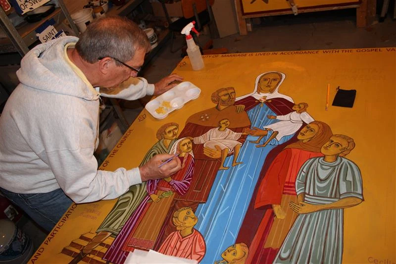 ‘Holiness of family life’: A look behind the icon depicting a mother of 8 #Catholic 
 
 Father Richard Reiser, an iconographer based in Omaha, Nebraska, writes an icon of St. Bridget of Sweden with her family for FOCCUS Marriage Ministries’ 40th anniversary. / Credit: Photo courtesy of FOCCUS

CNA Staff, Dec 13, 2025 / 06:00 am (CNA).
When an iconographer began his work on a unique icon, he looked to the bones of the saint’s husband for help.FOCCUS Marriage Ministries, a Catholic marriage ministry, invited the priest-iconographer Father Richard Reiser to make an icon of St. Bridget of Sweden, a mystic and the mother of eight. The ministry is celebrating its 40th anniversary this year and chose St. Bridget to be the patron saint of its work.But there was one challenge. According to Reiser, historically there is no established iconographic prototype of an icon of St. Bridget of Sweden.So using his imagination and every historical source available — including the bones of St. Bridget’s husband — the priest developed an entirely new icon of a saint who has gone without an icon for hundreds of years.The domestic church&nbsp;“For me, iconography is first and foremost a form of prayer,” Reiser said.&nbsp;“The entire creative process is an act of listening to God and allowing the sacred story of a saint or mystery to take shape through layers of contemplation, color, and symbolism.”The end result was an icon ripe with symbolic meaning — at its heart, marriage and family.At the blessing ceremony of the icon are (left to right): FOCCUS Director of Ministry Father Michael Grewe, Archbishop Michael McGovern of Omaha, FOCCUS Executive Director Sheila Simpson, and Iconographer Father Richard Reiser. Credit: Photo courtesy of FOCCUSFOCCUS Marriage Ministries chose St. Bridget of Sweden to be its patron because of her commitment to marriage and the Church.St. Bridget’s life “beautifully reflects the heart of marriage ministry,” Sheila Simpson, who heads the archdiocese-owned nonprofit, told CNA.Now displayed in the hallway of the FOCCUS office in the Archdiocese of Omaha, Nebraska, the icon contains a quote from Pope Benedict XVI about the family as the domestic church as well as several symbols of the married couple’s life together.&nbsp;“The icon quietly teaches that marriage is both a covenant of grace and a living witness to the Gospel,” Reiser told CNA.&nbsp;With St. Bridget as its guiding light, FOCCUS is launching resources for couples whose marriages have unusual challenges, such as those who need their marriage convalidated by the Church, as well as those marrying later in life.FOCCUS is most well known for its inventories — questionnaires designed to help engaged couples prepare for marriage by initiating conversations about issues like finance and values. The additional, new questionnaires will have questions tailored for couples in unusual situations, including military couples, first responders, and deacons.Simpson said many couples say FOCCUS “became a turning point — not because it told them what to do, but because it helped them truly hear each other.”Windows into the divine&nbsp;Reiser said that one of the most “fascinating” parts of the icon-making process was consulting the bones of Ulf Gudmarsson, the husband of St. Bridget.“His bones indicated that he was significantly larger in stature than she was,” he said.&nbsp;“To honor historical accuracy while still emphasizing Bridget’s spiritual prominence, I placed her on a small set of steps so she would remain the central figure of the composition,” he explained.&nbsp;Icons are “created for contemplation and spiritual truth more than realism,” Reiser said.&nbsp;“They are windows into the divine — visual theology meant to open the heart and mind to God’s presence,” he continued.&nbsp;“They participate in the mystery of the Incarnation,” Reiser said. “The eternal Word of God takes visible form.”The icon depicts an emblem of the Third Order Franciscans, which the couple joined after they got married.In addition, Gudmarsson holds a staff with a shell, referencing the pilgrimage the couple took to northwestern Spain.It would be the last pilgrimage the couple ever made together. On the return journey from the pilgrimage, Gudmarsson grew ill and died soon after they returned to Sweden.As a widow, St. Bridget dedicated her life to Christ, founding the religious order now known as the Bridgettines, which still exists to this day.The icon of St. Bridget of Sweden and her family by Father Richard Reiser contains many symbols, such as the staff and shell, the 15 florets, and the clasp of St. Bridget’s cloak. Framing the icon are words from Pope Benedict XVI on the domestic church. Credit: Courtesy of FOCCUSAn icon of family and unityIconographers don’t paint — they write.“Every line, color, and gesture carries symbolic meaning,” Reiser said. “That is why we often say icons are ‘written’ rather than painted.”For instance, the 15 florets below St. Bridget of Sweden reference her 15 meditations on Christ’s passion. The cloak she wears has a brooch styled to symbolize the five wounds of Christ. Within the brooch is a relic of St. Bridget.“Writing the icon of St. Bridget of Sweden was a unique and grace-filled experience because, historically, there is no established iconographic prototype of her — especially not one depicting her with her family,” Reiser said. “Without a traditional image to follow, I drew from existing paintings of St. Bridget and shaped them within the contemplative, dignified structure of classical iconography.”With “no established icon tradition for Bridget’s family,” Reiser said he “consulted other family-centered icons, especially images of Christ with children, to discern how to portray children in an authentically iconographic style.”The paintings of the children visually form a circle, which Reiser said represents the unity of the family. One of the children, Ingeborg, holds bluebells, the national flower of St. Bridget’s homeland, Sweden.“Each of these details helps the icon speak not just as artwork but as a theological meditation on the holiness of family life,” Reiser said.