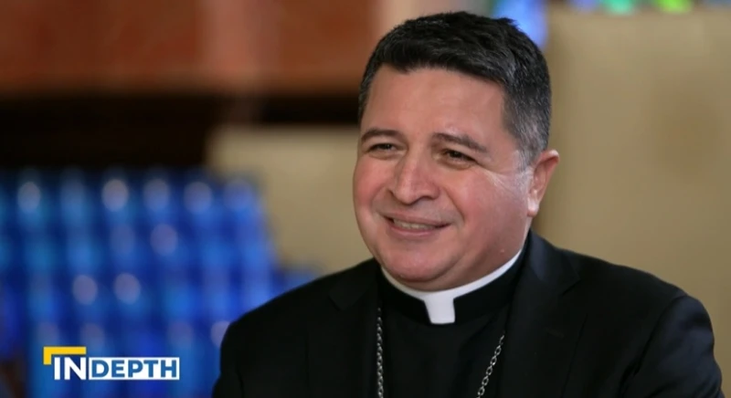 ‘Our Lady of Guadalupe is the mother of all’: DC pilgrimage highlights value of migrants #Catholic 
 
 Bishop Evelio Menjivar speaks with “EWTN News in Depth” on Friday, March 14, 2025. / Credit: “EWTN News in Depth”

Washington, D.C. Newsroom, Dec 15, 2025 / 16:36 pm (CNA).
The Virgin Mary’s role as comforter to all was specially highlighted during a pilgrimage through the streets of Washington, D.C., Saturday morning.&nbsp;“Our Lady of Guadalupe is the mother of all. She envelops each one of us with the same tenderness and the same love, no matter our country of origin or language,” Auxiliary Bishop Evelio Menjívar said during his homily at the Basilica of the National Shrine of the Immaculate Conception.&nbsp;The words from the bishop, who was born in El Salvador, came after the Archdiocese of Washington’s annual “Walk with Mary” procession that began at the Shrine of the Sacred Heart, a Hispanic Catholic parish. Participants also prayed a rosary upon arriving at the basilica, which holds 2,500 people and was filled to capacity, according to the archdiocese.&nbsp;The archdiocese billed this year’s celebration of the pilgrimage honoring Our Lady of Guadalupe on her feast day as “highlight[ing] a call to accompany and pray for migrants and refugees, reflecting the Church’s mission of compassion, solidarity, hope, and peace.”&nbsp;“For more than a decade, thousands of pilgrims from diverse cultures and backgrounds have walked side by side, lifting their voices in prayer and songs of praise,” the archdiocese said. “Along the way, participants celebrate the archdiocese’s rich cultural diversity and unity in Jesus Christ, while reflecting on the appearance of the young mestiza Virgin of Guadalupe to the peasant St. Juan Diego on a hilltop near Mexico City in 1531.”The Mass, which included a reenactment of the story of Mary’s apparition to St. Juan Diego, was celebrated by Cardinal Robert McElroy of Washington; Cardinal Christophe Pierre, apostolic nuncio to the United States; and Auxiliary Bishops Menjívar, Juan Esposito, and Roy Campbell.Menjívar interspersed his homily, which was mostly in Spanish, with reflections in English on the Virgin Mary and the Church’s role in accompanying poor and marginalized communities, particularly migrants.“Let me say this in English because I believe it is very important for us to understand Mary reflects what the Church is called to be,” Menjívar said. “In the apostolic exhortation Dilexi Te [“I Have Loved You”] Pope Leo affirms the Church, like a mother, accompanies those who are walking. Where the world sees threats, she sees children. Where walls are built, she builds bridges.”The Virgin Mary, he said, regards “every rejected migrant” as “Christ himself, who knocks at the door of the community.”&nbsp;Reflecting on the significance of Our Lady of Guadalupe, Menjívar noted that Mary “did not manifest herself to a powerful or well-educated person.”&nbsp;“She appeared to Juan Diego, a simple, poor, Indigenous man, marginalized by the systems of his time,” the bishop said. “With this, God proclaims another truth. He takes the side of the little ones, the despised, the ones who do not count.”&nbsp;“So the good news,” he concluded, “is this: For God, we do count, and a lot, because we are his sons and daughters.”