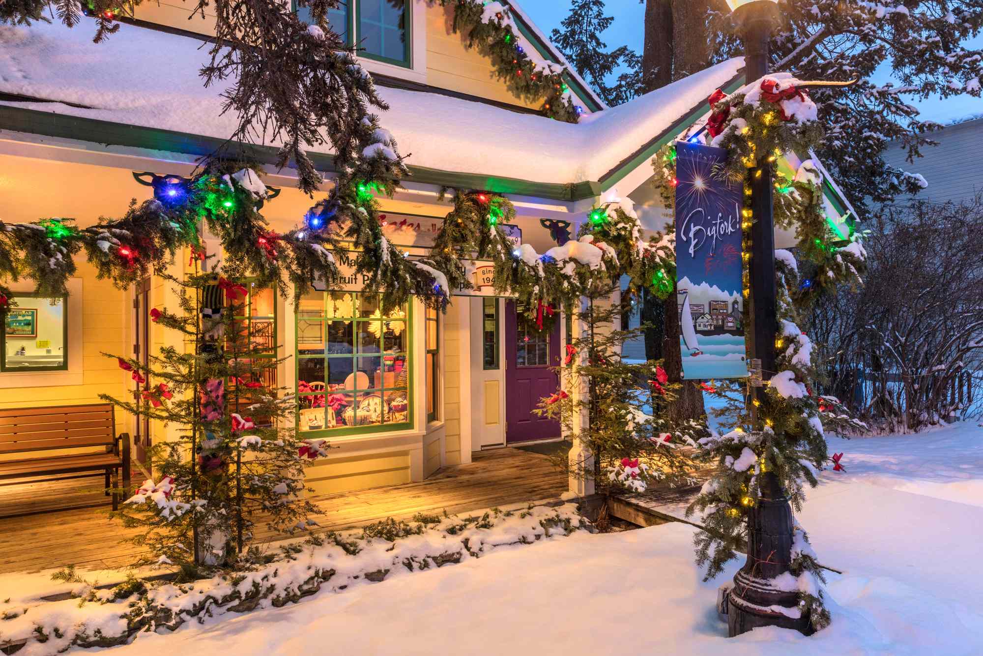 This Montana Town Looks Like a Christmas Card—And ‘Elves’ Decorate It Each Year With 10,000 Feet of Garland and Lights #Travel For a picture-perfect holiday trip, visit Bigfork, Montana.