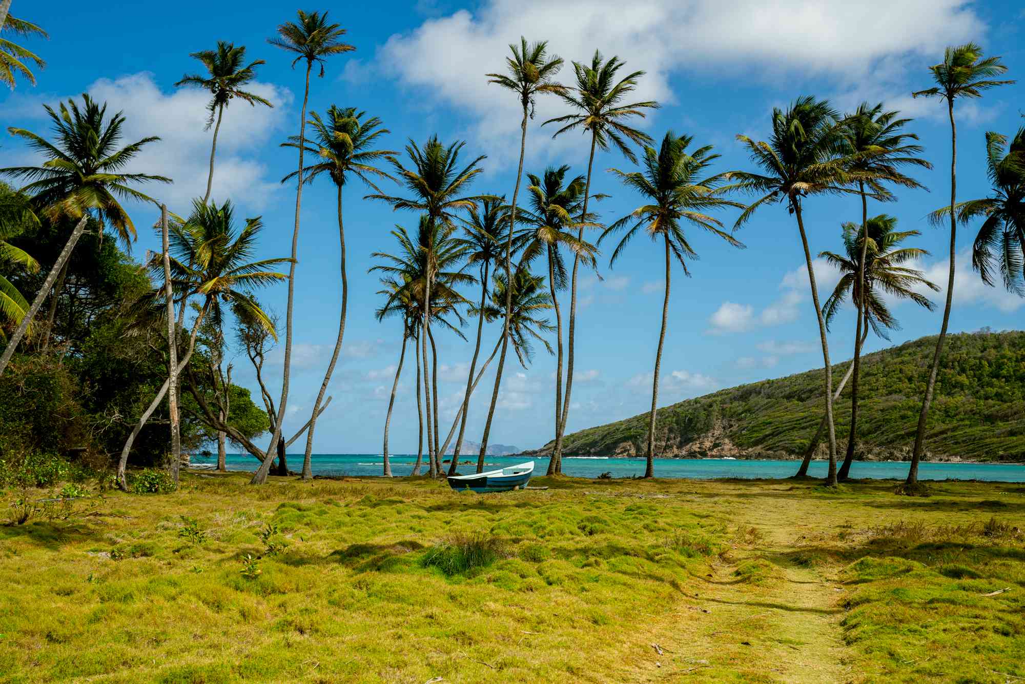 You Can Drive Across This Tiny Caribbean Island in Under 30 Minutes—and It Has Pristine Beaches and a Floating Bar #Travel Here’s everything you need to know to plan the perfect trip to Bequia.