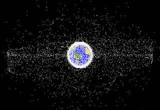 Hubble Nets Menagerie of Young Stellar Objects - A bright reflection nebula shares the stage with a protostar and planet-forming disk in this Hubble image.