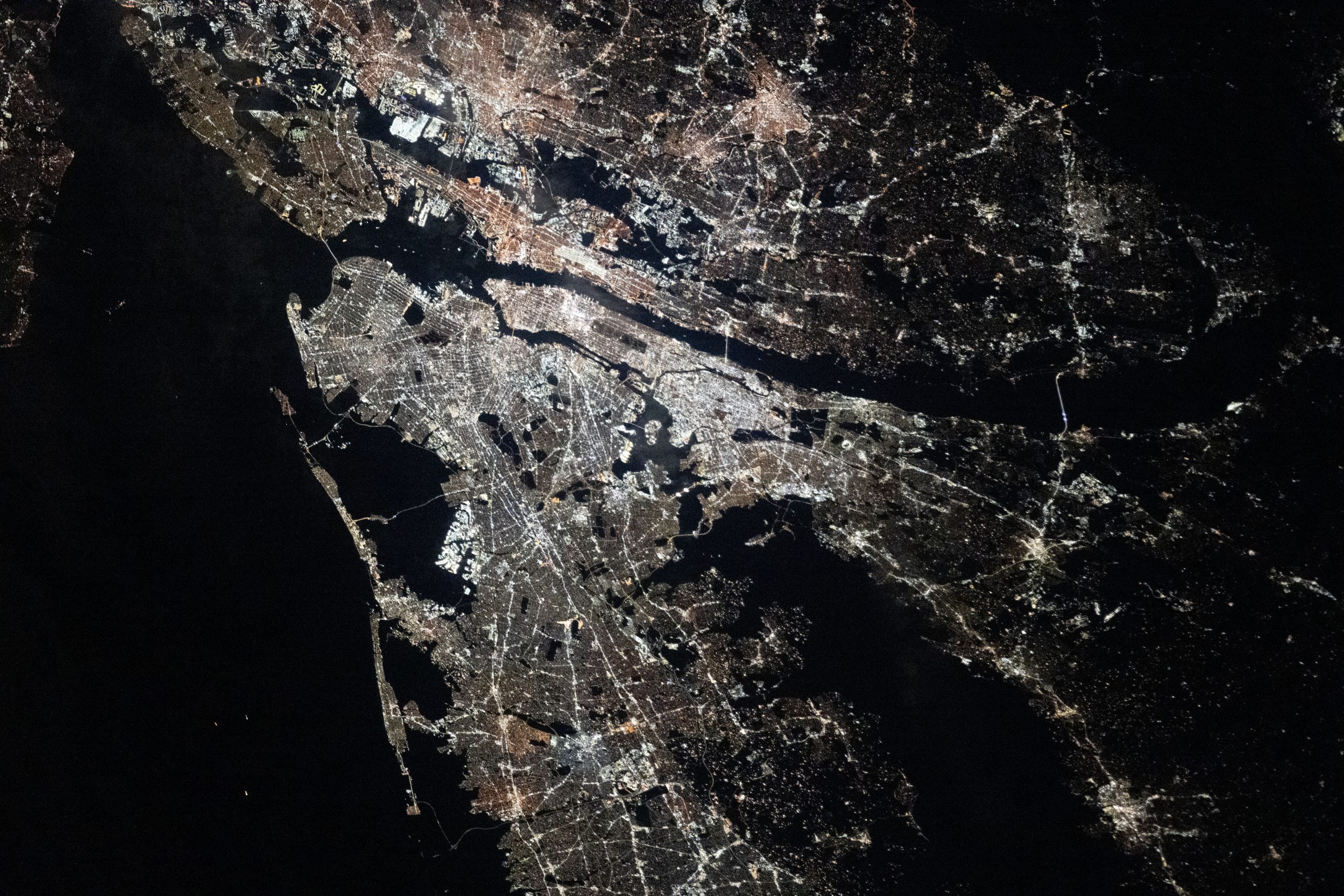 New York–Newark–Jersey City Metropolitan Area – The New York–Newark–Jersey City Metropolitan Statistical Area, which spans 23 counties across New York, New Jersey, and Connecticut and has a population of about 19.9 million, is pictured at approximately 3:29 a.m. local time Dec. 20, 2025, from the International Space Station as it orbited 262 miles above the Atlantic coast.