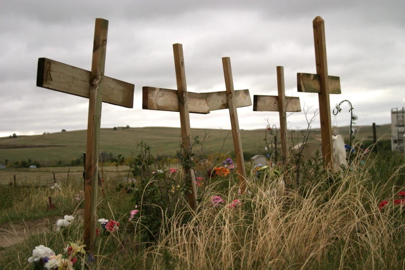 Bishop Bullock, local Jesuits criticize Hegseth’s honor of Wounded Knee soldiers – #Catholic – 
 
 Crosses stand in a row at the Wounded Knee Memorial in South Dakota. / Credit: Von Roenn/Shutterstock

Washington, D.C. Newsroom, Oct 22, 2025 / 15:24 pm (CNA).
Rapid City, South Dakota, Bishop Scott E. Bullock and South Dakota Jesuit leaders criticized U.S. Defense Secretary Pete Hegseth for honoring U.S. soldiers who carried out an 1890 assault on a Lakota reservation near the Wounded Knee Creek.“Those who died at Wounded Knee are sacred,” the joint statement read.“Jesus stands with all who suffer and die at the hands of others,” the statement added. “Those who committed the violence are also sacred; for this reason, Jesus offers them mercy and healing. Yet the acts themselves were grave evils and cannot be honored.”On Dec. 29, 1890, U.S. soldiers killed nearly 300 Lakota people in an assault now known as the “Wounded Knee Massacre” or the “Battle of Wounded Knee” in South Dakota. Most of the Lakota killed were civilians, including unarmed women and children, and 31 American soldiers were killed.After a review, Hegseth announced last month that 20 U.S. soldiers awarded the Medal of Honor for actions at Wounded Creek will retain those honors. The Medal of Honor is the nation’s highest military honor, awarded by Congress for risk of life in combat beyond the call of duty. A review panel commissioned by former Secretary of Defense Lloyd Austin recommended they retain their honors in October 2024.“That panel concluded that these brave soldiers should, in fact, rightfully keep their medals for actions in 1890,” Hegseth said in a Sept. 25 post on X.Hegseth criticized Lloyd for not issuing a final decision on the inquiry last year, saying “he was more interested in being politically correct than historically correct.”“We’re making it clear — without hesitation — that the soldiers who fought in the Battle of Wounded Knee in 1890 will keep their medals, and we’re making it clear that they deserve those medals,” Hegseth said. “This decision is now final and their place in our nation’s history is no longer up for debate. We salute their memory, we honor their service, and we will never forget what they did.”Bishop, Jesuits call for ‘prayerful correctness’Bullock, whose diocese serves western South Dakota where the assault took place, was joined in his statement by the De Smet Jesuit Community of West River, South Dakota.They said their opposition to the Medals of Honor is not rooted in “political correctness,” as Hegseth called it, but rather in “prayerful correctness, grounded in truth, conscience, and compassion.”Bullock and the Jesuits said soldiers massacred civilians: “This was not a battle. To recognize these acts as honorable is to distort history itself.”“We acknowledge the government’s intent to honor its troops, yet we reject any narrative that erases the humanity of the victims or glorifies acts of violence,” they said.The statement said as Catholics and followers of Christ, “we proclaim the infinite dignity of every human life. We confess that humanity — capable of love and goodness — is also capable of terrible evil.” It added that the Crucifixion and Resurrection “reveal that true victory comes not through killing but through suffering love, mercy, and truth.”“If we deny our part in history, we deepen the harm,” they said. “We cannot lie about the past without perpetuating injustice and moral blindness. Even if we are not personally responsible for Wounded Knee, we bear a moral responsibility to remember and speak the truth.”Susan Hanssen, a history professor at the University of Dallas (a Catholic institution), told CNA Wounded Knee “was a complex historical event” that had “many conflicting narratives.” She said military records show conflicting accusations, investigations, and personal rivalries among military officers.She said, with historical events, there is not always “easy moral clarity.” She said the events “cannot simply be viewed as an unprovoked massacre, racially motivated against all Native Americans indiscriminately.”Hanssen expressed concern that the effort to revoke the honors for soldiers at Wounded Knee is part of an ongoing effort to target “American and Western culture,” which includes destroying statues of Christopher Columbus and attacks on George Washington, Thomas Jefferson, and Abraham Lincoln, among others.“It is perfectly reasonable for the United States government to refuse to revoke Medals of Honor from over a hundred years ago,” she added.No Medals of Honor have been revoked for any reason in more than a century. The only time medals were revoked was in 1917, when Congress commissioned a comprehensive review of Medal of Honor recipients and revoked more than 900.