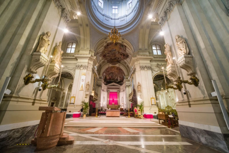 Bishops denounce rising Mafia-style violence in Sicily following murder of 21-year-old – #Catholic – 
 
 Capella di Santa Rosa, St. Rosalia’s Chapel inside of the Palermo Cathedral, Basilica Cattedrale Metropolitana Primaziale della Santa Vergine Maria Assunta in Sicily, Itay, on May 5, 2022. / Credit: Frank Bienewald/LightRocket via Getty Images

Rome, Italy, Oct 21, 2025 / 08:00 am (CNA).
The murder of a 21-year-old Italian man after trying to break up a fight has prompted two southern Italian archbishops to sound the alarm against the rise of Mafia-style killings among young people.  At a prayer service Oct. 18 for Paolo Taormina, who was killed one week ago outside the family-owned bar where he worked, Archbishop Gualtiero Isacchi of Monreale, Italy, told the faithful present that their presence was “a sign of resistance and a desire for change.”“The violent, typically Mafia-like logic of oppression, which some shamefully and unconsciously praise on social media, aims to erase human conscience and dignity, to extinguish hope, and to condemn the person to the resignation of ‘nothing will ever change,’” Isacchi said, according to SIR, the news agency of the Italian bishops’ conference.Archbishop Corrado Lorefice of Palermo also attended the prayer service, which was held at St. Philip Neri Church, located in the Zen neighborhood, the same area where Taormina was murdered. Invoking the memory of Blessed Pino Puglisi, a parish priest who was killed by the Mafia in 1993, Lorefice urged the people of Monreale and Palermo to “take on the challenge” of protecting youth from the influence of the Mafia and gang-related organizations.“We must shout to young people that criminal organizations do not want their happiness, and we must remember that the center of the city is wherever the person is,” the archbishop said.  Taormina’s murder is the latest in a series of gangland-style shootings related to a perceived rise in youth violence and organized crime in Monreale and Palermo.In April, three young men — Massimo Pirozzo, Salvatore Turdo, and Andrea Miceli — were shot and killed after four men — one of whom was 19 years old — shot at a crowd after an argument broke out. Two others were seriously injured in the shooting, which was dubbed “The Monreale Massacre.” Taormina’s alleged killer, 28-year-old Gaetano Maranzano, was the son of one of the area’s known drug kingpins and was caught with other firearms after he was arrested at his home.  At the prayer service, Isacchi said that some may view their gathering to pray for an end to violence as “useless“ or perhaps look at it “with an air of sufficiency and superiority.” Nevertheless, “we choose to listen to the faint inner voice that whispers to us: ‘God is there, lying on the ground next to Paolo, Massimo, Andrea, Salvo, to all our sons and friends, victims of senseless armed violence,’“ he said. “It is a voice that calls us, asking us to do our part to stop the violence and restore dignity to every person and every environment.”Father Giovanni Giannalia, pastor of St. Philip Neri Parish, told SIR that while many singled out the troubled Zen neighborhood as “trivial” and “violent,” there are still “many people willing to do good, and doing it here is more tiring than elsewhere.”  “Youth violence is worrying: three deaths in Monreale, one in Palermo. The situation is out of control, it’s an emergency,” Giannalia said, adding that everyone, especially priests, who “encounter evil” must fight against it. The warnings from Church leaders highlighted concerns regarding escalating violence among young people, particularly in Sicily, where the local Mafia, known as “Cosa Nostra,“ has taken to recruiting young people. According to a February report by the “Global Initiative Against Transnational Organized Crime,” a demographic analysis conducted after raids against the Mafia organization found that of 181 individuals arrested, 40 were under the age of 35 and 10 were under the age of 25.  Following Taormina’s murder, Isacchi and Lorefice issued a joint statement Oct. 14 saying they had hoped that “The Monreale Massacre” would mark a turning point in the region that would end the wave of youth violence.  “Today, we renew the same hope. We believe that change is possible,” the bishops wrote. “May Paolo’s life become a sign of the transformation of our cities: a seed of rebirth.”“Let us entrust ourselves to Our Lady of Sorrows,” the archbishops added. “Only she knows how to enter the pierced heart of a mother who holds her murdered son in her arms, but also into the heart of the mother of a son who is a killer. May the mother of Jesus teach us the way of rebirth, love for the little ones, the poor, the children, and for those who have no voice; the way of nonviolence and peace.” 