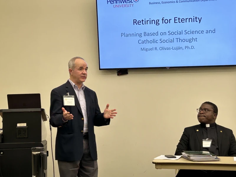 Catholic social scientists reframe perspective on retirement #Catholic
As Father Emmanuel Nanabanyin Conduah (right) looks on, PennWest University Professor Miguel Olivas-Luján (left) delivers his paper “Retiring for Eternity: Planning Based on Social Science and Catholic Social Thought” during the 2025 annual conference of the Society of Catholic Social Scientists at the Franciscan University of Steubenville. / Credit: Ken Oliver-Méndez/CNA
Washington, D.C. Newsroom, Oct 29, 2025 / 10:08 am (CNA).
“Retiring for Eternity: Planning Based on Social Science and Catholic Social Thought” was among the topics the Society of Catholic Social Scientists examined during its 2025 annual conference, held Oct. 24–25 on the campus of Franciscan University of Steubenville, Ohio.In his presentation on the topic, Miguel Olivas-Luján, a professor of business at PennWest University, called for a transformative vision of retirement, one that “transcends conventional models of successful or active aging.”“While secular frameworks emphasize health, financial stability, and social engagement, Catholic social teaching invites a deeper reflection on the spiritual dimensions of aging, particularly the preparation for eternal life,” Olivas-Luján pointed out.Catholic retirementIn Catholic social teaching, Olivas-Luján explained, aging and retirement are not viewed as periods of decline but as opportunities for deepening solidarity within families, communities, and the Church. Recent developments in Catholic social teaching on aging include the work of Professor Peter Kevern, who in a 2018 paper identified the elderly as bearers of unique charisms — wisdom, memory, and interdependence — that substantially enrich both eccesial and civic communities.The Catholic view on aging, Olivas-Luján continued, considers the spiritual, relational, and ethical contributions of older adults to be “indispensable to the flourishing of both Church and society.”Professor Miguel Olivas-Luján noted that the elderly are “bearers of unique charisms — wisdom, memory, and interdependence” that enrich both ecclesial and civic communities. Credit: Ken Oliver-Méndez/CNAIn his presentation, Olivas-Luján explained how the foundational principles of Catholic social thought affirm the inherent worth of older adults and their continued role in society. He cited the Catechism of the Catholic Church, which affirms the understanding that because of each person’s essential human dignity, for example, as individuals age their value remains constant, rooted in their divine origin and eternal destiny. Retirement is thus, in Olivas-Luján’s words, “an ideal time to accelerate the pace and intentionality toward this union with God, once work-related preoccupations no longer take the highest priority.”Practical implicationsFor many older adults, Olivas-Luján noted, the end of a professional career can lead to feelings of isolation or a loss of direction. Catholic parishes and ministries, however, offer a unique and spiritually enriching environment that help retirees remain engaged, purposeful, and connected to their communities.Through their ministries, volunteer opportunities, and social events, for example, parishes and organizations like the Knights of Columbus provide retirees with opportunities to continue contributing meaningfully. The Catholic Health Association has also documented how faith communities can help retirees maintain their physical, emotional, and spiritual health through holistic support systems that integrate prayer, service, and fellowship.In addition, Olivas-Luján cited studies that show that seniors with strong spiritual engagement experience lower rates of depression and anxiety, and register greater life satisfaction and improved physical health. Nonetheless, the Church’s understanding of suffering in old age also reframes physical decline and existential questioning as pathways to grace and communion with Christ. The PennWest professor pointed out that from a Catholic perspective and specifically when viewed through the lens of redemptive suffering, “human pain, when united with trust in Christ’s redeeming passion, can contribute to personal sanctification and the salvation of others.”Ultimately, as Olivas-Luján put it, retirement and aging are not problems to be solved but vocations to be lived, “a sacred season rich with opportunities for love, service, and spiritual flourishing.” Catholic social scientists reframe perspective on retirement #Catholic
As Father Emmanuel Nanabanyin Conduah (right) looks on, PennWest University Professor Miguel Olivas-Luján (left) delivers his paper “Retiring for Eternity: Planning Based on Social Science and Catholic Social Thought” during the 2025 annual conference of the Society of Catholic Social Scientists at the Franciscan University of Steubenville. / Credit: Ken Oliver-Méndez/CNA
Washington, D.C. Newsroom, Oct 29, 2025 / 10:08 am (CNA).
“Retiring for Eternity: Planning Based on Social Science and Catholic Social Thought” was among the topics the Society of Catholic Social Scientists examined during its 2025 annual conference, held Oct. 24–25 on the campus of Franciscan University of Steubenville, Ohio.In his presentation on the topic, Miguel Olivas-Luján, a professor of business at PennWest University, called for a transformative vision of retirement, one that “transcends conventional models of successful or active aging.”“While secular frameworks emphasize health, financial stability, and social engagement, Catholic social teaching invites a deeper reflection on the spiritual dimensions of aging, particularly the preparation for eternal life,” Olivas-Luján pointed out.Catholic retirementIn Catholic social teaching, Olivas-Luján explained, aging and retirement are not viewed as periods of decline but as opportunities for deepening solidarity within families, communities, and the Church. Recent developments in Catholic social teaching on aging include the work of Professor Peter Kevern, who in a 2018 paper identified the elderly as bearers of unique charisms — wisdom, memory, and interdependence — that substantially enrich both eccesial and civic communities.The Catholic view on aging, Olivas-Luján continued, considers the spiritual, relational, and ethical contributions of older adults to be “indispensable to the flourishing of both Church and society.”Professor Miguel Olivas-Luján noted that the elderly are “bearers of unique charisms — wisdom, memory, and interdependence” that enrich both ecclesial and civic communities. Credit: Ken Oliver-Méndez/CNAIn his presentation, Olivas-Luján explained how the foundational principles of Catholic social thought affirm the inherent worth of older adults and their continued role in society. He cited the Catechism of the Catholic Church, which affirms the understanding that because of each person’s essential human dignity, for example, as individuals age their value remains constant, rooted in their divine origin and eternal destiny. Retirement is thus, in Olivas-Luján’s words, “an ideal time to accelerate the pace and intentionality toward this union with God, once work-related preoccupations no longer take the highest priority.”Practical implicationsFor many older adults, Olivas-Luján noted, the end of a professional career can lead to feelings of isolation or a loss of direction. Catholic parishes and ministries, however, offer a unique and spiritually enriching environment that help retirees remain engaged, purposeful, and connected to their communities.Through their ministries, volunteer opportunities, and social events, for example, parishes and organizations like the Knights of Columbus provide retirees with opportunities to continue contributing meaningfully. The Catholic Health Association has also documented how faith communities can help retirees maintain their physical, emotional, and spiritual health through holistic support systems that integrate prayer, service, and fellowship.In addition, Olivas-Luján cited studies that show that seniors with strong spiritual engagement experience lower rates of depression and anxiety, and register greater life satisfaction and improved physical health. Nonetheless, the Church’s understanding of suffering in old age also reframes physical decline and existential questioning as pathways to grace and communion with Christ. The PennWest professor pointed out that from a Catholic perspective and specifically when viewed through the lens of redemptive suffering, “human pain, when united with trust in Christ’s redeeming passion, can contribute to personal sanctification and the salvation of others.”Ultimately, as Olivas-Luján put it, retirement and aging are not problems to be solved but vocations to be lived, “a sacred season rich with opportunities for love, service, and spiritual flourishing.”