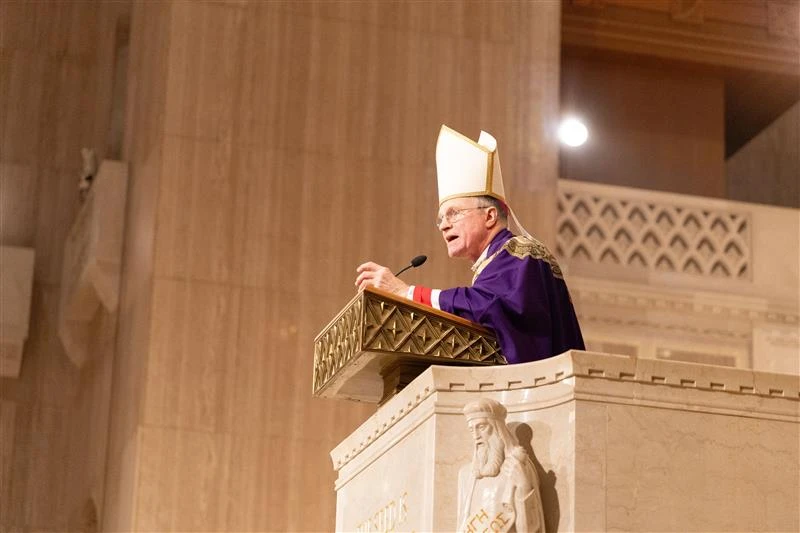 Military archdiocese: Army’s response to canceled religious contracts ‘inadequate’ #Catholic 
 
 Archbishop Timothy Broglio speaks at Mass on Dec. 3, 2023. / Credit: The Basilica of the National Shrine of the Immaculate Conception

Washington, D.C. Newsroom, Oct 22, 2025 / 18:04 pm (CNA).
The Archdiocese for the Military Services, USA, expressed concern that the U.S. Army is not adequately addressing its discontent with canceled religious contracts, which the archdiocese said is straining its ability to minister to Catholics in the armed forces.This month, the Army canceled all contracts for three roles: coordinators of religious education (CRE), Catholic pastoral life coordinators (CPLC), and musicians. The contract terminations affected Catholics and those of other faiths.CREs served as catechists trained by the archdiocese to assist the priests in religious education in the military chapels. The archdiocese also trained CPLCs who offered administrative support such as liturgy coordination, assistance with sacramental record documentation, and weekly bulletin preparation. Contracts also included musicians, usually pianists who played music during Mass.Military Services Archbishop Timothy Broglio sent a letter to Congress on Oct. 17 saying Army officials assured him that religious affairs specialists (RAS) and directors of religious education (DREs) — federal employees — would accommodate the needs of the archdiocese amid the canceled contracts but that he believes this is not possible.Neither an RAS nor a DRE is a trained catechist, he explained, and neither are properly trained or qualified to perform the roles of people who served in the canceled contracts. There is no requirement for a DRE to be Catholic or for an RAS to have any faith.In response to the archdiocesan complaint, an Army spokesperson told CNA it would reexamine its contract support for RASs and DREs “to mitigate any potential impact during this period.“Archdiocese: Response is ‘wholly inadequate’Elizabeth A. Tomlin, a lawyer for the archdiocese, told CNA that the Army’s response is “wholly inadequate” and “demonstrates the spokesperson’s total lack of understanding of the issue.”“Merely eight DREs across the entire Army are Catholics, so most DREs are not qualified to direct Catholic religious education,” Tomlin said.“[RASs] are soldiers, [usually] anywhere from private first class to staff sergeant in rank,” she explained. “There is no requirement whatsoever for RASs to be Catholic or have any training in catechesis or catechetical methodology that could possibly equip them to coordinate religious education.”Tomlin rejected the Army’s assertion that people in these positions could fulfill the work of the CREs, CPLCs, or musicians.“Without meeting the basic requirement of a catechist, namely, to be a confirmed Catholic, these people are not qualified to be involved in Catholic religious education programs whatsoever,” she said.Tomlin said the only way to have music during Mass is if someone volunteers.“It is factually inaccurate that DREs or RASs are fulfilling the duties of CREs, CPLCs, or liturgical musicians,” Tomlin said.‘No knowledge of our faith’Jena Swanson — who worked as a Catholic CRE at Fort Drum from August 2024 until her contract was canceled on March 31, 2025 — told CNA she agrees with the archdiocese’s assessment that those employees cannot fulfill the roles of those whose contracts were canceled.She said she helped facilitate religious education classes, Bible studies, sacrament preparation classes, and retreats, and collected sacramental records, among a variety of other tasks. She said she mostly worked independently of the DRE because that employee did not have much knowledge about the Catholic faith.“The DRE is not guaranteed to be Catholic depending on the installation military families are stationed at,” Swanson said. “In our 13 years of military family life (my husband is active duty Army), we’ve experienced one Catholic DRE and only for two years.”She said in her experience, RASs “are as helpful as they can be” but often “have no knowledge of our faith.”Swanson said the Catholic community at Fort Drum “was thrown into a bit of chaos” once her contract ended. Some weeks there were no teachers for religious education, families did not know whom to direct questions to, and weekly Mass attendance dropped about 50%.“Our families want answers and want to continue coming to our parish, but if these options are not open it will drastically affect attendance and faith formation,” Swanson said.