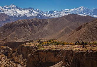 Picture of the day





View of the village of Gyakar surrounded by a poplar grove in the Upper Mustang region of Nepal. The summits of the Damodar Himal, the Purkung Himal and the Annapurnas are visible in the distance. A suspended bridge over the deep canyon (left) connects it to the neighbouring Chele village and thence to the rest of Nepal.
 #ImageOfTheDay