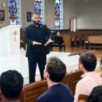 Young adults urged to trust God at Jubilee event in Clifton #Catholic - People have many worries in these uncertain times — from far-reaching concerns such as increasingly polarized politics and war to personal issues such as family troubles. Sometimes, these worries lead Daisy Reyes, 27, of Holy Trinity Parish in Passaic, N.J., to ask, “Where is God in our lives?”
Reyes received God’s reassurance through the words of two clergy who spoke at the Jubilee of Young Adults of the Paterson Diocese in New Jersey at St. Andrew the Apostle Church in Clifton on the afternoon of Oct. 26. There, Father Starli Castaños, parochial vicar of the Cathedral of St. John the Baptist in Paterson, N.J. urged the more than 140 participants from at least 10 young adult parish groups around the diocese to trust God. Later, Bishop Kevin J. Sweeney urged the young adults to “open their hearts wide” to the Lord during a Mass he celebrated.
“Their messages showed me that God is saying to us, ‘Here I am in your lives.’ Father Starli and Bishop Sweeney challenged us to surrender to God and pray more,” said Reyes, a preschool teacher. She said the Jubilee event was a “wonderful way to connect as a young-adult community and with the bishop, our leader, who is guiding us to God.”

Click here to subscribe to our weekly newsletter.

Young adults from the diocese and beyond, including a few from New York, attended the Jubilee celebration. Attending were individual young adults, diocesan officials, consecrated religious, and priests who concelebrated the Mass with Bishop Sweeney. The young adult event was the final diocesan observance of the Universal Church’s Jubilee of Hope 2025, preceding the closing Mass on Dec. 28 at 3 p.m. at the Cathedral of St. John the Baptist in Paterson.
In his bilingual talk before the Mass, Father Castaños noted that young people worry about all types of life decisions, including about college and career.
“Also, we are all broken vessels in need of healing. Trust and surrender to the Lord in tough times. He will build you up,” Father Castaños said. He reminded participants that God will answer in his time and according to his will — not theirs. “We need to trust him so we can go out and become pilgrims of hope.”
In his homily at the bilingual Mass, Bishop Sweeney encouraged young adults to believe and trust that a life of faith as a committed disciple is an exciting “adventure,” a word first used by St. Pope John Paul II, who said, “Life with Christ is an adventure.”
Jessica Alvarez, of the young adult ministry, EPIC, at St. Anthony of Padua Parish in Passaic, N.J., and a team planned and organized the celebration. Father Jeider Barraza, pastor of St. Andrew’s, hosted the event after a last-minute venue change. Salesian Sister Theresa Lee, diocesan chancellor and delegate for religious, and Brian Honsberger, a former staff member at St. Paul’s Center for Evangelization Inside the Walls in Madison, N.J., have been organizing all of the diocesan Jubilee events.
Along with Father Charles Lana, diocesan vocations director, each young adult group on the planning team staffed an exhibitor’s table where all attending could learn more about Corazon Puro, Young Catholic Professionals (YCP-NJ), St. Paul’s, and EPIC.
In his homily, Bishop Sweeney made another reference to a life of faith as an “adventure,” this time from Pope Leo XIV’s homily at the Jubilee of Young Adults in Rome on Aug. 3.
“It is truly beautiful, especially at a young age, to open wide your hearts, to allow him [God] to enter, and to set out on this adventure with him towards eternity,” the pontiff said, according to Bishop Sweeney.
BEACON PHOTOS | JOE GIGLI
 [See image gallery at beaconnj.org]  