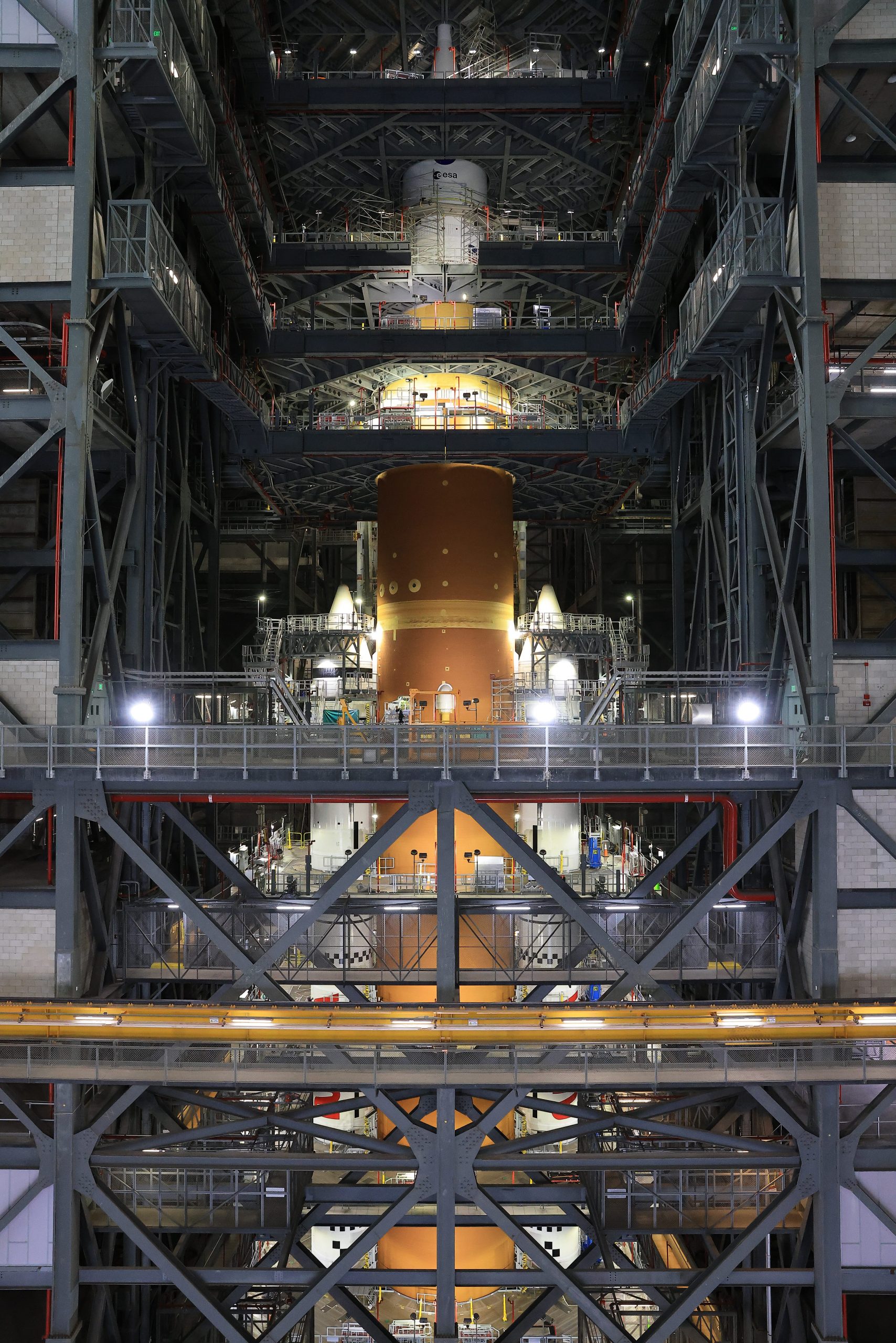 Artemis II Orion Spacecraft Stacked – NASA’s Artemis II Orion spacecraft with its launch abort system is stacked atop the agency’s SLS (Space Launch System) rocket in High Bay 3 of the Vehicle Assembly Building at NASA’s Kennedy Space Center in Florida on Monday, Oct. 20, 2025. The spacecraft will carry NASA astronauts Reid Wiseman, Victor Glover, Christina Koch, and CSA (Canadian Space Agency) astronaut Jeremy Hansen on a 10-day mission around the Moon and back in early 2026.