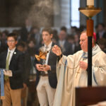 Delbarton remembers beloved parent, football coach at Bishop’s Mass #Catholic - The Delbarton School community in Morristown, N.J., on Nov. 4 welcomed Bishop Kevin J. Sweeney of the Diocese of Paterson in New Jersey, who celebrated the school’s annual Bishop’s Mass. The bishop led the community in reflecting on faith, life, and resurrection, and honoring beloved Delbarton father and varsity football coach Nick Mangold, who died at 41 of complications from liver disease on Oct. 25, and his family.
That day, Bishop Sweeney celebrated the 9:30 a.m. Mass, which was concelebrated by monks of the Benedictine community that administers Delbarton. At that time, many Delbarton community members, including Benedictine Father Michael Tidd, headmaster; football players; students; and staff, were among those preparing for the start of a Mass of Christian Burial for Mangold at 10:30 a.m. at St. Vincent Martyr Church in Madison, N.J. Mangold was a Delbarton varsity offensive line coach. 

Click here to subscribe to our weekly newsletter.

“We are grateful for Bishop Sweeney’s presence and support of the Delbarton community,” the school posted on social media after the Mass.
BEACON PHOTOS | JOE GIGLI
 [See image gallery at beaconnj.org]  