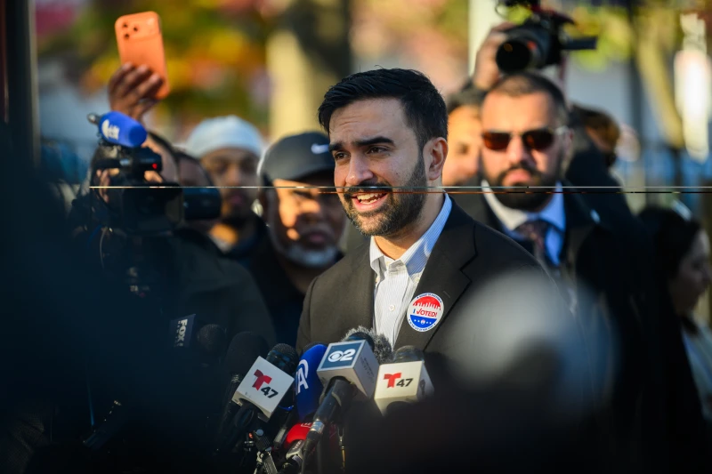 Democratic socialist Zohran Mamdani wins New York City mayoral race – #Catholic – 
 
 Democratic Mayor-Elect Zohran Mamdani speaks to members of the media during a press conference after voting on Nov. 4, 2025. / Credit: Alexi J. Rosenfeld/Getty Images

Washington, D.C. Newsroom, Nov 4, 2025 / 22:25 pm (CNA).
Mayor-elect Zohran Mamdani, a Democratic socialist who promotes gender ideology and abortion access, won his bid for mayor of New York City on Nov. 4, decisively defeating his two main opponents: former Gov. Andrew Cuomo and talk show host Curtis Sliwa.Mamdani, a 34-year-old member of the New York State Assembly and the Democratic Party’s nominee for mayor, took 50.4% of the vote on Tuesday. As of 9:42 p.m. ET, 75% of the vote had been tallied.Cuomo, who served as governor as a Democrat and ran as an independent for mayor, received 41.3% of the vote. Sliwa, the Republican nominee, finished third with 7.5% of the vote.Mamdani, set to be sworn in on Jan. 1, 2026, will be the city’s first Muslim mayor. He will succeed Democratic Mayor Eric Adams, who suspended his reelection bid in late September.New York City’s mayoral race gained significant national attention after Mamdani secured an upset victory in the Democratic primary against Cuomo. Mamdani ran an anti-establishment campaign and called himself “the sole candidate running with a vision for the future of this city” during the final debate.Mamdani embraced gender ideology during his campaign, vowing to provide  million in tax funding for hormone therapy drugs and surgeries as a response to President Donald Trump’s executive order to strip federal funding from health care providers that provide such drugs and surgeries to children.He also intends to create “an office of LGBTQIA+ affairs” and declare New York City a sanctuary for “LGBTQIA+” people. As a member of the Legislature, he also supported a bill to prohibit law enforcement from aiding out-of-state investigations into health care professionals who provide hormone therapy drugs and surgeries to minors.The mayor-elect’s campaign supported abortion access as well. He has promised to double city tax funding for the New York Abortion Access Fund and the city’s Abortion Access Hub. He has also vowed to “protect New Yorkers from” pro-life pregnancy centers, which he accused of spreading “false or deceptive information.”Pro-life pregnancy centers have fought numerous lawsuits against states they accuse of censoring their speech in recent years.Mamdani has also pledged to create a “baby basket” for parents with newborns, which will provide resources, such as diapers, baby wipes, nursing pads, postpartum pads, swaddles, and books. He expects this to cost less than  million annually.The mayor-elect has further vowed to end all city cooperation with Immigration and Customs Enforcement (ICE) and will not use any city resources to help enforce immigration laws. His platform calls for 5 million in funding to support legal defenses for people who are at risk of being deported.Mamdani has promised to freeze rent for New Yorkers who live in rent-stabilized apartments and eliminate fares for city buses. He plans to establish city-owned grocery stores that he says will provide lower prices and intends to provide no-cost child care for families. He supports raising the minimum wage to  by 2030.To pay for the costs, in part, the mayor-elect has said he will raise the top state corporate tax from 7.5% to 11.5% and add an additional 2% income tax on anyone making more than  million annually. He estimates this will generate  billion in additional revenue, though critics have questioned those estimations.
