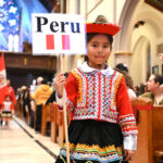 Diversity celebrated at colorful Mass of Nations in Clifton #Catholic - St. Paul Parish in Clifton, one of the most culturally rich parishes in the Paterson Diocese in New Jersey, delighted in its diversity on Nov. 23 with a trilingual Mass of Nations for the Feast of the Lord Jesus Christ, King of the Universe, also known as the Feast of Christ the King.
Bishop Kevin J. Sweeney celebrated the liturgy, which was said in English, Spanish, and Tagalog, the Filipino language. Father Leonardo Jaramillo, St. Paul’s pastor, who was born in Colombia, and Father Vic Karljohn R.R. Leviste, parochial vicar of St. Therese Parish in the Succasunna neighborhood of Roxbury Township, N.J., who was born in the Philippines, concelebrated the Mass. Deacon Hector Castellanos of St. Paul’s assisted with the Mass.

Click here to subscribe to our weekly newsletter.

Many in the congregation wore festive costumes from their native countries and heritages. The Mass began with the parish’s traditional flag procession of nations carried by families. Flags from dozens of countries were held, led by the United States flag, which served as the anchor of the procession.
As in years past, the readings for the Mass and the Prayers of the Faithful were also read in the different languages of the parish community. The parish motto is “Many cultures, many countries, many languages in one body: St. Paul’s Family.”
After the Mass, a reception was held with parishioners bringing dishes typical of their home country to share with others.
BEACON PHOTOS | JOE GIGLI
 [See image gallery at beaconnj.org]  