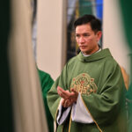 Filipino priest joyfully installed as pastor of Parsippany parish #Catholic - St. Ann Parish in Parsippany, N.J., delighted in the installation of its new pastor, Father Nico Quintos, by Bishop Kevin J. Sweeney during a Mass the bishop celebrated in the church on Oct. 25.
In May, Bishop Sweeney named Father Quintos pastor of St. Ann’s, effective July 1, while continuing as an auditor and advocate of the Marriage Tribunal of the Paterson Diocese in New Jersey and as minister to the retired senior priests. The new pastor previously served as parochial vicar of St. Philip the Apostle Parish in Clifton, N.J. Bishop Sweeney ordained him to the diocesan priesthood on Aug. 1, 2020.
Bishop Sweeney celebrated the Oct. 25 installation Mass, which was concelebrated by many fellow priests and was assisted by deacons.

Click here to subscribe to our weekly newsletter.

Born in Malolos City in the Province of Bulacan, Philippines, Father Quintos earned a bachelor’s degree in philosophy and communications from St. Paul Seminary in Cavite, the Philippines, in 2013 and a master’s degree in divinity and a master’s degree in moral theology from Mount St. Mary’s Seminary in Emmitsburg, Md., in 2020.
Father Quintos is pursuing a master’s degree in professional counseling at Seton Hall University in South Orange, N.J.
“He is an engaging speaker who considers the Christian life an adventure of the most exhilarating kind and a pilgrimage that moves onward and upward. His preaching invites us on a renewed journey toward God and encourages us to deepen our relationship with Jesus,” St. Ann’s bulletin stated about Father Quintos.
BEACON PHOTOS | JOE GIGLI
 [See image gallery at beaconnj.org]  