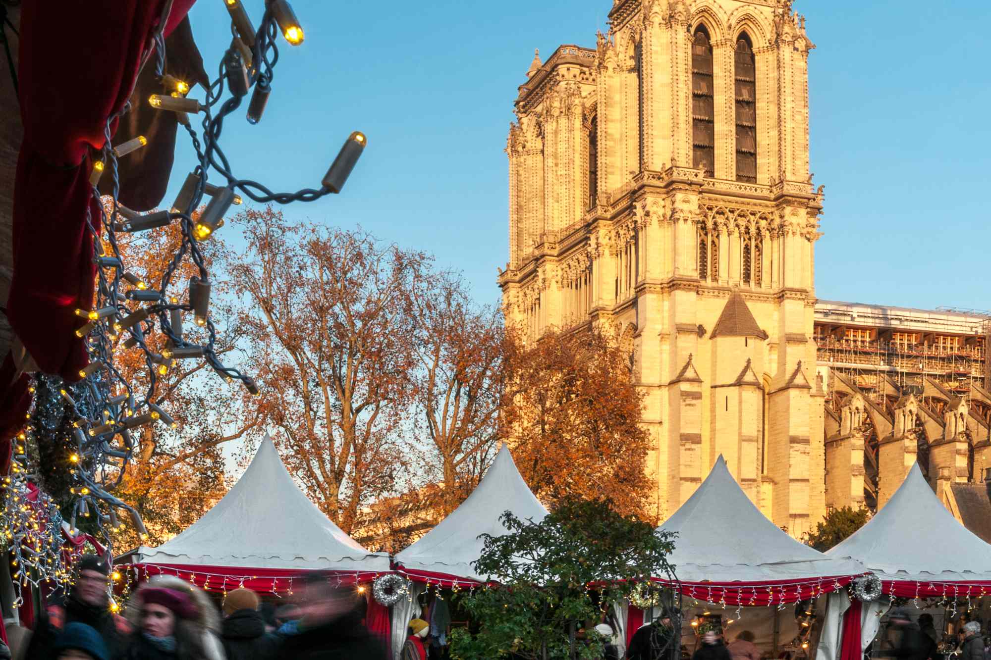 How to Plan a Festive Trip to Paris This Holiday Season #Travel Christmas in the City of Light is magical, with festive luxury hotels, twinkling lights, and beautiful holiday markets.