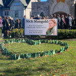 In Madison, hearts break for late Jets great, Delbarton coach #Catholic - Nick Mangold loved being in the thick of the action. There he was having fun presiding over the spring fundraiser for St. Vincent Martyr School in Madison, N.J., while wearing a tuxedo T-shirt under a jacket and a backwards cap.
“Nick made sure everybody had a good time and was patient as people came up and wanted to take pictures with him,” Msgr. George Hundt, former pastor of St. Vincent’s Parish, said Mangold, who was a retired center for the Jets — and a local celebrity.
On Nov. 4, family, friends, and members of the Jets and Delbarton School in Morristown, N.J., gathered for a Mass of Christian Burial in St. Vincent’s Church to honor the faith, kindness, generosity, and work ethic of Nicholas Allan Mangold, who unexpectedly died on Oct. 25. He died of complications from liver disease. He was 41.
Still in shock, mourners attending the liturgy remembered Mangold as a larger-than-life figure — a big man with a big heart — who loved above all his faith, family, and football — in that order. Since retiring from the NFL in 2018, he poured his passion into his family: his wife, Jennifer, and their four children. He was an active parent at St. Vincent’s School and a volunteer at St. Vincent’s Parish and in Madison, where he lived. Mangold had been the offensive line coach for Delbarton’s varsity football since last year.

Click here to subscribe to our weekly newsletter.

“Nick understood that the blessings he was given weren’t meant to serve himself [but] to share with his family, friends, and every community,” Msgr. Hundt, now pastor of St. Gerard Majella and Our Lady of Pompei parishes, both in Paterson, said in remarks at the end of the Mass. “That’s why we can be assured today that as Nick steps into heaven, he’s hearing those words we all want to hear one day: ‘Well done, good and faithful servant. Come into the place that I have prepared for you.'”
Msgr. Hundt joined Father Owen Moran, current pastor of St. Vincent’s; Benedictine Father Michael Tidd, headmaster of Delbarton; and Father Jose Zuniga, St. Vincent’s parochial vicar, in celebrating the funeral Mass. Father Moran delivered the homily. Members of the Jets and Delbarton communities participated in the liturgy. Also that morning, the rest of the Delbarton community remembered Mangold at its annual Mass with Bishop Kevin J. Sweeney.
Demonstrating leadership and grit, Mangold had 11 well-respected seasons with the Jets, earning seven Pro Bowl selections and a spot in the Jets’ Ring of Honor. The Ohio native is now a candidate for the Pro Football Hall of Fame’s Class of 2026. Earlier, Mangold helped the Ohio State Buckeyes clinch a National Championship in 2002.
Far from the NFL, Mangold and his wife were raising their four children — Matthew, Eloise, Thomas, and Charlotte — in the Catholic faith and making memories with them. They attended weekly Mass. The children attended Catholic school. Mangold coached some of their sports and cheered them from the sidelines. They also took trips around the world, including to Disney.
Mangold also supported causes such as the Madison PBA and the Special Olympics.
“Forty-one is too young [to die], but when we present our lives to God, at the end of our lives, however old we will be, it’s not a matter of how old we are. What did we do? What difference did we make? How did we love? How did we forgive, if necessary? How did we bring others to God? How did we reflect God’s love by our lives? Nick ticked all those boxes — and more,” Father Moran said. “Today, Nick invites all of us to live our faith well. He put God first, used his gifts, and enjoyed the ride.”
St. Vincent’s School honored Mangold on social media. The community recited the Luminous Mysteries of the rosary in tribute.
“We asked that the same light of Christ that shone during these mysteries also surround Nick and his family. Nick will never be forgotten. His kindness, generosity, and light will remain in our hearts always,” St. Vincent’s posted on social media.
The standing-room-only attendance at Mangold’s funeral “reflected how many people Nick touched,” said Alan Faneca, a retired NFL guard who played with Mangold on the Jets from 2008-09. He delivered a reflection at the end of Mass.
“It’s the way Nick made people feel. You felt seen, cared for, and valued because of his genuine heart. He’d make your day better with a joke or smile,” Faneca said.
Delbarton varsity football honored Mangold on Nov. 1 during its first game since his death. On their helmets, players wore #74, his Jets number, and passed out hats with #74 and green ribbons. Mangold made his mark by bringing his extensive NFL experience and mentorship skills to the high school level.
Head Coach Brian Bowers told NJ.com about the difficulty of keeping the players focused in the wake of Mangold’s death.
“Our kids have done a great job really supporting one another. It’s difficult for teenagers to go through any loss, let alone the loss of someone they love so much like Coach Mangold,” Bowers said.
When he came to Delbarton, Mangold was humble despite his NFL successes. He was “like a sponge,” soaking up knowledge and wanting to learn more about high school coaching. His son, Matthew, plays freshman football, said Tony Negrin, Delbarton’s athletic director.
“Nick was professional but also passionate and competitive,” Negrin said. “He was the first in to work and the last to leave. He was larger than life, but the players treated him like any other coach. Nick wanted to be part of the community.”