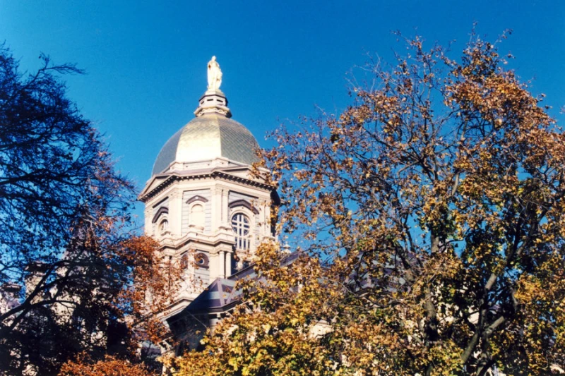 Notre Dame drops ‘acceptance and support for Catholic mission’ from staff values #Catholic 
 
 The University of Notre Dame. / Credit: Matt B. via Flickr (CC BY-NC-SA 2.0)

Washington, D.C. Newsroom, Nov 16, 2025 / 07:00 am (CNA).
Here’s a roundup of the latest Catholic education news in the United States:Notre Dame drops ‘acceptance and support for Catholic mission’ from staff values The University of Notre Dame has dropped acceptance and support for its Catholic mission from the list of staff values it has held for the past 20 years. The university’s leadership announced new updates to its staff values at its Fall 2025 Staff Town Halls on Oct. 29 and 30, according to a press release. Human Resources President Heather Christophersen said the new values were “an expression of how we seek to advance Notre Dame’s mission as a global, Catholic research university.”Prior to the change, Notre Dame’s staff values were as follows: — Accountability: Takes responsibility and ownership for decisions, actions, and results. Accountable for both how and what is accomplished— Teamwork: Works cooperatively as a member of a team and is committed to the overall team objectives rather than own interests— Integrity: Demonstrates honest and ethical behavior that displays a high moral standard. Widely trusted, respectful, and honorable— Leadership in Excellence: Demonstrates energy and commitment to improving results, takes initiatives often involving calculated risks while considering the common good— Leadership in Mission: Understands, accepts, and supports the Catholic mission of the university and fosters values consistent with that missionThe new and pared down values and their descriptions are: — Community: Treat every person with dignity and respect.— Collaboration: Work together with honesty, kindness, and humility.— Excellence: Pursue the highest standards with a commitment to truth and service.— Innovation: Embrace opportunities with creativity and dedication.According to the Notre Dame Observer, Christophersen said in an email to staff that the former Notre Dame values “had only one value that pointed into mission” and that the decision to remove the “Leadership in Mission” value was motivated by a desire to reframe the school’s Catholic mission as all-encompassing. She said the old values had caused confusion in staff evaluation processes during annual performance reviews and that the school does not monitor religious affiliation for staff in the same way as faculty and students. Notre Dame did not return multiple requests for comment.University of St. Francis and Belleville Diocese announce student admission partnershipThe University of St. Francis (USF) and the Diocese of Belleville, Illinois, have announced a new partnership guaranteeing admission for diocesan high school graduates. Students from Althoff Catholic High School, Mater Dei Catholic High School, and Gibault Catholic High School will have guaranteed admission at the university as well as the opportunity to earn scholarships of up to ,000. “We are so pleased with this partnership and look forward to welcoming students from the Catholic high schools within the Belleville Diocese,” University of St. Francis President Ryan C. Hendrickson said in a press release announcing the partnership. “In addition to the guaranteed admission, USF plans to host workshops and information sessions for diocese-based school counselors, teachers, parents, and prospective students. USF will also offer campus visitation days, facilitating exploration and engagement with the diocese schools,” the release stated.Archdiocese of Hartford to open 2 new Catholic schools amid Mass attendance boom The Archdiocese of Hartford, Connecticut, will open two new Catholic schools next year as Mass attendance and renewed interest in the faith continues to rise. “A lot of the decisions that are being made in the public-school systems are not decisions that a lot of people find easy to hold, and they’re looking for places where they could just find a little bit less politics,” Archbishop Christopher Coyne said, emphasizing the important role of Catholic schools in this environment, according to a local report. Coyne said elsewhere that the new school openings come amid “a great reversal of the downward trends we experienced before and during COVID.”One of the schools, Chesterton Academy of St. Francis of Assisi, will accept ninth and 10th grade students in fall 2026. The other school, the Catholic Academy of Hartford, will accept pre-K through second graders starting in the fall, adding a grade each year until it reaches the eighth grade. The school will operate on an income-based tuition model. St. Anselm College announces reception of  million gift St. Anselm College, a Benedictine liberal arts school in New Hampshire, announced a  million gift, the largest donation in the school’s 136-year history. The gift was from Robert and Beverly Grappone, whose son, Greg, graduated from the college in 2004 and passed away from cancer at the age of 35. “While many colleges and universities are struggling in a challenging higher education environment, St. Anselm is fortunate to have a different story,” the college said in a press release announcing the historic gift. “The college has seen enrollment growth over the last four years, increasing each year since the post-COVID class. This year’s incoming freshmen class set a record with 647 students. The college has a retention rate of 90%.”The gift includes  million designated for the school of business, which will be named the Robert J. Grappone School of Business and Innovation, a  million endowment to the Grappone Humanities Institute, and “multimillion dollar renovations” to the school’s residence halls, support for the athletic complex, an endowment for the school’s nursing program, scholarships, and further campus improvements.