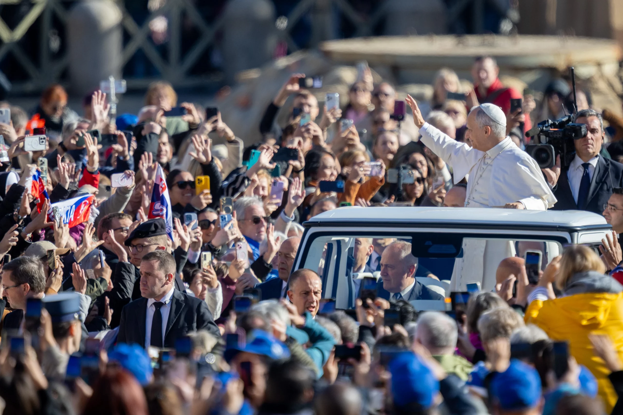 Pope Leo XIV: Fraternity is ‘one of the great challenges for contemporary humanity’ – #Catholic –
Pope Leo XIV gives his apostolic blessing at the end of the general audience in St. Peter’s Square on Nov. 12, 2025. / Credit: Daniel Ibanez/CNA
Vatican City, Nov 12, 2025 / 08:00 am (CNA).
Pope Leo XIV reflected Wednesday on the world’s need for fraternity — a gift from Christ that frees us from selfishness and division.Fraternity “is without doubt one of the great challenges for contemporary humanity, as Pope Francis saw clearly,” the pope said during his general audience in St. Peter’s Square on Nov. 12.“The fraternity given by Christ, who died and rose again, frees us from the negative logic of selfishness, division, and arrogance,” he added.Continuing his meditations on Christ’s death and resurrection, Leo said “to believe in the death and resurrection of Christ and to live paschal spirituality imbues life with hope and encourages us to invest in goodness.”He observed that fraternity “cannot be taken for granted, it is not immediate. Many conflicts, many wars all over the world, social tensions and feelings of hatred would seem to prove the opposite.”Fraternity “is not a beautiful but impossible dream; it is not the desire of a deluded few,” he emphasized, inviting the faithful “to go to the source, and above all to draw light and strength from him who alone frees us from the poison of enmity.”The importance of relationshipsThe pope reflected that “fraternity stems from something deeply human. We are capable of relationship and, if we want, we are able to build authentic bonds between us. Without relationships, which support and enrich us from the very beginning of our life, we would not be able to survive, grow, or learn. They are manifold, varied in form and depth. But it is certain that our humanity is best fulfilled when we exist and live together, when we succeed in experiencing authentic, not formal, bonds with the people around us.”He warned that “if we turn in on ourselves, we risk falling ill with loneliness, and even a narcissism that is concerned with others only out of self-interest. The other is then reduced to someone from whom we can take, without ever being truly willing to give, to offer ourselves.”Recalling that “disagreement, division, and sometimes hatred can devastate even relationships between relatives, not only between strangers,” the pope cited St. Francis of Assisi’s greeting of “omnes fratres,” (“all brothers”) — “the inclusive way in which the saint placed all human beings on the same level, precisely because he recognized them in their common destiny of dignity, dialogue, welcome, and salvation.”Pope Leo XIV waves at the crowds gathered in St. Peter’s Square for his general audience on Nov. 12, 2025. Credit: Daniel Ibanez/CNALeo noted that Pope Francis had reproposed this approach in his encyclical Fratelli Tutti, emphasizing that the word “tutti” — Italian for “everyone” — “expresses an essential feature of Christianity, which ever since the beginning has been the proclamation of the good news destined for the salvation of all, never in an exclusive or private form.”He explained that “this fraternity is based on Jesus’ commandment, which is new insofar as he accomplished it himself, the superabundant fulfillment of the will of the Father: Thanks to him, who loved us and gave himself for us, we can in turn love one another and give our lives for others, as children of the one Father and true brothers and sisters in Jesus Christ.”They weep and rejoice together“Brothers and sisters support each other in hardship, they do not turn their back on those who are in need, and they weep and rejoice together in the active pursuit of unity, trust, and mutual reliance,” the pope said. “The dynamic is that which Jesus himself gives to us: ‘Love one another as I have loved you’ (cf. John 15:12).”He concluded his general audience by reminding the faithful that “the fraternity given by Christ, who died and rose again, frees us from the negative logic of selfishness, division, and arrogance, and restores to us our original vocation, in the name of a love and a hope that are renewed every day. The Risen One has shown us the way to journey with him, to feel and to be ‘brothers and sisters all.’”This story was first published by ACI Prensa, CNA’s Spanish-language news partner. It has been translated and adapted by CNA. Pope Leo XIV: Fraternity is ‘one of the great challenges for contemporary humanity’ – #Catholic –
Pope Leo XIV gives his apostolic blessing at the end of the general audience in St. Peter’s Square on Nov. 12, 2025. / Credit: Daniel Ibanez/CNA
Vatican City, Nov 12, 2025 / 08:00 am (CNA).
Pope Leo XIV reflected Wednesday on the world’s need for fraternity — a gift from Christ that frees us from selfishness and division.Fraternity “is without doubt one of the great challenges for contemporary humanity, as Pope Francis saw clearly,” the pope said during his general audience in St. Peter’s Square on Nov. 12.“The fraternity given by Christ, who died and rose again, frees us from the negative logic of selfishness, division, and arrogance,” he added.Continuing his meditations on Christ’s death and resurrection, Leo said “to believe in the death and resurrection of Christ and to live paschal spirituality imbues life with hope and encourages us to invest in goodness.”He observed that fraternity “cannot be taken for granted, it is not immediate. Many conflicts, many wars all over the world, social tensions and feelings of hatred would seem to prove the opposite.”Fraternity “is not a beautiful but impossible dream; it is not the desire of a deluded few,” he emphasized, inviting the faithful “to go to the source, and above all to draw light and strength from him who alone frees us from the poison of enmity.”The importance of relationshipsThe pope reflected that “fraternity stems from something deeply human. We are capable of relationship and, if we want, we are able to build authentic bonds between us. Without relationships, which support and enrich us from the very beginning of our life, we would not be able to survive, grow, or learn. They are manifold, varied in form and depth. But it is certain that our humanity is best fulfilled when we exist and live together, when we succeed in experiencing authentic, not formal, bonds with the people around us.”He warned that “if we turn in on ourselves, we risk falling ill with loneliness, and even a narcissism that is concerned with others only out of self-interest. The other is then reduced to someone from whom we can take, without ever being truly willing to give, to offer ourselves.”Recalling that “disagreement, division, and sometimes hatred can devastate even relationships between relatives, not only between strangers,” the pope cited St. Francis of Assisi’s greeting of “omnes fratres,” (“all brothers”) — “the inclusive way in which the saint placed all human beings on the same level, precisely because he recognized them in their common destiny of dignity, dialogue, welcome, and salvation.”Pope Leo XIV waves at the crowds gathered in St. Peter’s Square for his general audience on Nov. 12, 2025. Credit: Daniel Ibanez/CNALeo noted that Pope Francis had reproposed this approach in his encyclical Fratelli Tutti, emphasizing that the word “tutti” — Italian for “everyone” — “expresses an essential feature of Christianity, which ever since the beginning has been the proclamation of the good news destined for the salvation of all, never in an exclusive or private form.”He explained that “this fraternity is based on Jesus’ commandment, which is new insofar as he accomplished it himself, the superabundant fulfillment of the will of the Father: Thanks to him, who loved us and gave himself for us, we can in turn love one another and give our lives for others, as children of the one Father and true brothers and sisters in Jesus Christ.”They weep and rejoice together“Brothers and sisters support each other in hardship, they do not turn their back on those who are in need, and they weep and rejoice together in the active pursuit of unity, trust, and mutual reliance,” the pope said. “The dynamic is that which Jesus himself gives to us: ‘Love one another as I have loved you’ (cf. John 15:12).”He concluded his general audience by reminding the faithful that “the fraternity given by Christ, who died and rose again, frees us from the negative logic of selfishness, division, and arrogance, and restores to us our original vocation, in the name of a love and a hope that are renewed every day. The Risen One has shown us the way to journey with him, to feel and to be ‘brothers and sisters all.’”This story was first published by ACI Prensa, CNA’s Spanish-language news partner. It has been translated and adapted by CNA.