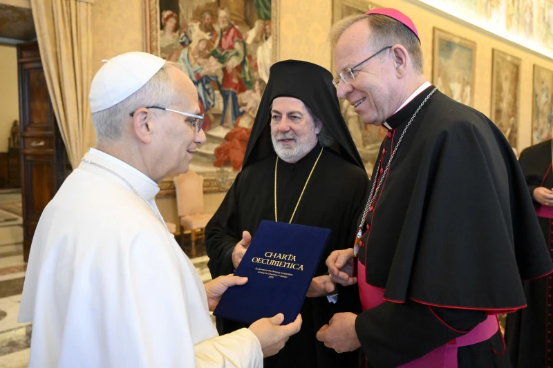 Pope Leo XIV receives European Christian leaders after signing of new Ecumenical Charter - #Catholic - 
 
 Archbishop Gintaras Grušas and Greek Orthodox Archbishop Nikitas Loulias present the signed updated Ecumenical Charter to Pope Leo XIV on Nov. 6, 2025. / Credit: Vatican Media

ACI Prensa Staff, Nov 6, 2025 / 18:29 pm (CNA).
Pope Leo XIV received in a Nov. 6 audience the members of the Council of European Bishops’ Conferences (CCEE, by its Spanish acronym), the Ecumenical Council of Churches (CEC), and the representatives of the Christian Churches of Europe, who met in Rome to sign the updated “Charta Œcumenica.”Signed in 2001 by the presidents of the Conference of European Churches (CEC) and the CCEE, the Ecumenical Charter has been the cornerstone of European ecumenical cooperation for more than two decades. The revised version seeks to address contemporary challenges and reflect the changing realities of European society and Christianity.The revision process, initiated in 2022, was led by a joint working group of the CEC and the CCEE. To this end, input from churches and ecumenical organizations throughout Europe was considered for the purpose of ensuring that the updated text responds to current ecumenical needs.The updated version was signed on Nov. 5 by Archbishop Gintaras Grušas of Vilnius, Lithuania, the president of the CCEE, and by Greek Orthodox Archbishop Nikitas Loulias of Thyateira and Great Britain.Challenges on the ecumenical journeyDuring the meeting at the Apostolic Palace, the Holy Father emphasized that “the challenges Christians face on the ecumenical journey are constantly evolving,” and for this reason, it has been necessary to reexamine the situation in Europe.Loulias, president of the CEC, explained to ACI Prensa, CNA’s Spanish-language news partner, after the audience with the Holy Father that “the world has changed” and that the realities of 25 years ago are not the same as those of today.“Now there is the problem of migration, and how to treat migrants and the laws related to it. Also, how to confront nationalism, populism, ideas based on prejudice and hate, and what we, as Christians, preach: peace,” he emphasized.The pope also noted in his address the importance of “constant and careful” discernment while lamenting that many Christian communities in Europe “feel increasingly like a minority.”In this context, he recalled that new peoples are arriving in Europe that must be welcomed and listened to, promoting dialogue, harmony, and fraternity, particularly “amid the clamor of violence and war, whose echoes resound throughout the continent.”“In all these situations,” the pope continued, “the grace, mercy, and peace of the Lord are truly vital, because only divine help will show us the most convincing way to proclaim Christ in these changing contexts.”The pontiff referred to the ecumenical document as a “testimony to the willingness of the Churches of Europe to look at our history with the eyes of Christ” and noted that “the synodal path is ecumenical, just as the ecumenical path is synodal.”In this regard, he emphasized that the new Ecumenical Charter “highlights the common path undertaken by Christians of different traditions in Europe, capable of listening to one another and discerning together in order to proclaim the Gospel more effectively.”Sharing a common visionFurthermore, Pope Leo highlighted that one of the most remarkable achievements of the review process has been “the ability to share a common vision on contemporary challenges and to establish priorities for the future of the continent while maintaining a firm conviction in the enduring relevance of the Gospel.”In this regard, Loulias commented to ACI Prensa on the progress made on the path of ecumenism, emphasizing that “a hundred years ago, we didn’t even speak to each other.”Although he acknowledged that challenges and problems still exist, especially due to language differences, he noted that this update “has allowed us to come together, cooperate, work together, respect one another, exchange thoughts and ideas, and recognize the values ​​we share.”At the end of his address, the Holy Father also expressed his desire to proclaim to all the peoples of Europe that “Jesus Christ is our hope, because he is both the path we must follow and the ultimate destination of our spiritual pilgrimage.”Loulias referred to Pope Leo XIV as “a very humble, very thoughtful, and very kind man. We discussed various topics, and of course, I asked him to pray for peace during our private conversation.”“As an Orthodox Christian and as a representative of the Ecumenical Patriarchate, I am proud to have been part of this process. Now the pope is preparing to travel to Istanbul to meet with the ecumenical patriarch [Bartholomew I]; these are significant signs of what is happening,” he said.This story was first published by ACI Prensa, CNA’s Spanish-language news partner. It has been translated and adapted by CNA.