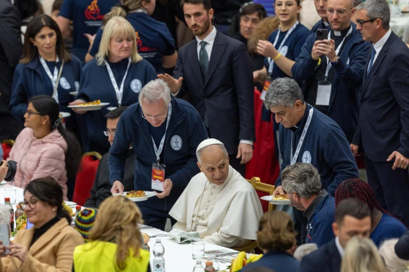 Pope Leo XIV shares lunch with more than 1,300 people in need at the Vatican – #Catholic – 
 
 Pope Leo XIV shares lunch with people in need at the Vatican on November 16, 2025. / Daniel Ibáñez

Vatican City, Nov 16, 2025 / 11:15 am (CNA).
Pope Leo XIV had lunch on Sunday with more than 1,300 people experiencing poverty and social exclusion, gathering with them in the Vatican’s Paul VI Hall for a festive meal marking the World Day of the Poor.The hall was transformed into a vast dining room for the occasion. The event was organized by the Congregation of the Mission on behalf of Vincentian missionaries worldwide, who this year celebrate the 400th anniversary of the founding of their congregation and of the Daughters of Charity. Volunteers served lasagna, breaded chicken with potatoes, and the traditional Italian dessert babà.As on similar occasions in past years, the Vatican, through the papal almoner Polish Cardinal Konrad Krajewski, invited a group of transgender people from the Roman seaside town of Torvaianica. Father Andrea Conocchia, a parish priest in Torvaianica, told ACI Prensa that he had accompanied about 50 transgender people from his community to the event.In a special effort to highlight dignity and respect, the Vatican provided full table service with proper dishes, flatware, and table linens—avoiding plastic or disposable materials. Organizers said the aim was not only to offer a meal but to create an experience of welcome and care for each guest.After the meal, the pope thanked the Vincentian family for its service to the most vulnerable. “This lunch that we now receive is offered by Providence and by the great generosity of the Vincentian Community, to whom we wish to express our gratitude,” he said.The pope also shared his joy at spending time with the poor on a day instituted by his predecessor. “With great joy we gather this afternoon for this lunch on the World Day of the Poor, which was so desired by my beloved predecessor, Pope Francis,” he said.He expressed gratitude for all who dedicate themselves to those in need: “So many priests, religious sisters, and lay volunteers devote their lives to helping people who experience various needs. We are filled with gratitude for them.”Before the meal, he prayed: “May the Lord bless the gifts we are about to receive, bless the life of each one of us, our loved ones, and all those who have accompanied us on our journey.” He also remembered those suffering around the world: “Let us invoke the Lord’s blessing upon those who suffer from violence, war, and hunger, and may we celebrate this feast today in a spirit of fraternity.”He concluded with a final blessing: “Bless our life, our fraternity. Help us always to walk united in your love. We ask this in the name of Jesus Christ, our Lord. Amen. Warm greetings and enjoy your meal!”Music added to the joyful atmosphere, with performances of classical and traditional Neapolitan pieces by 100 young people from Naples’ Rione Sanità neighborhood involved in the Sanitansamble and Tornà a Cantà educational programs of the Nova Opera ETS Foundation.At the end of the lunch, the Vincentian Family of Italy gave each participant a “St. Vincent’s Backpack” containing food and hygiene products as a sign of continued accompaniment.This story was first published by ACI Prensa, CNA’s Spanish-language news partner. It has been translated and adapted by CNA.