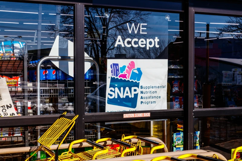 Trump administration will partially fund SNAP as Catholic groups try to fill gap – #Catholic – 
 
 President Donald Trump’s administration says Nov. 3, 2025, that it will partially fund Supplemental Nutrition Assistance Program (SNAP) benefits after several states sued to force a court order. / Credit: Jonathan Weiss/Shutterstock

Washington, D.C. Newsroom, Nov 3, 2025 / 17:08 pm (CNA).
President Donald Trump’s administration will partially fund Supplemental Nutrition Assistance Program (SNAP) benefits amid the ongoing government shutdown as Catholic nonprofits are working to accommodate people’s needs through charitable giving.Food stamp benefits from SNAP came to a temporary halt Nov. 1 after Congress failed to reach an agreement to end the government shutdown or approve a stand-alone SNAP funding bill.Several states sued, which led a federal court to order the administration to fully or partially fund the program. According to a Nov. 3 court filing, the U.S. Department of Agriculture (USDA) agreed to drain the SNAP contingency fund to ensure some benefits are received this month.The contingency fund can supply Americans on food assistance with about .6 billion in funds, which is about half of the  billion that was expected to be given. It is unclear when the benefits will show up on recipients’ Electronic Benefits Transfer (EBT) cards.Neither the USDA nor the White House responded to a request for comment.As the shutdown reached its 34th day on Nov. 3, lawmakers were still disagreeing over extending taxpayer subsidies that lower health insurance costs under the Affordable Care Act (ACA) and providing funding for a wall on the southern border, food assistance, and military pay. Most of the 2.9 million civilian federal workers are not receiving paychecks.Sen. Raphael Warnock, D-Georgia, questioned the USDA inspector general nominee John Walk on Oct. 30 about why the contingency fund wasn’t being used, which prompted the litigation from states.“There’s nothing legally stopping the administration from making emergency food assistance funds that they’re just sitting on available for Georgia kids and families in November,” Warnock said. “But even as we debate what to do about these ACA subsidies, it is indisputable that the USDA under the Trump administration is choosing to pull hungry children into this fight.”Filling the gapCatholic organizations that provide food assistance to low-income people have been trying to fill the gap amid the funding losses. Catholic Charities USA launched a national fundraising effort Oct. 30 to “come to the aid of our vulnerable brothers and sisters during this time of dire need,” according to a news release.Donations made through the new portal “will be used to buy and ship food directly to Catholic Charities agencies throughout the country that operate food pantries, soup kitchens, food delivery programs and a variety of other initiatives to support those facing hunger or food insecurity,” the news release noted. Some local Catholic Charities affiliates told CNA last week that they were committed to helping families in need access food but expressed concern that their organizations may be unable to fully supplement the billions of dollars in lost funding.John Berry, president of the Society of St. Vincent de Paul in the United States, said in a statement on Oct. 31 that the funding loss was “a bipartisan moral failure” and alleged that both parties “weaponized the defenseless.”“This crisis is not a distant tragedy: It is right in front of our face in the look in a mother’s eyes as she worries that her innocent children may soon feel the ache of an empty stomach,” Berry said.“Its roots run deep in the decisions of policymakers who have chosen partisan brinkmanship over human dignity, and the consequences demand an urgent moral critique through faith and reason,” he said. “This is not a partisan failure. Ironically, it’s one of the few times that both sides of the political aisle have managed to do something together — morally fail in their efforts to appeal to their supporters.”Archbishop Timothy Broglio, president of the U.S. Conference of Catholic Bishops, in an Oct. 28 statement urged lawmakers to find a solution that reopens the government and funds SNAP.Broglio called the funding loss “unjust and unacceptable” and “catastrophic for families and individuals who rely on SNAP to put food on the table.” He said it “places the burdens of this shutdown most heavily on the poor and vulnerable of our nation, who are the least able to move forward.” The shutdown is already the second-longest government shutdown. Unless it is quickly resolved, it will likely surpass the longest government shutdown, which was 35 days long and occurred during Trump’s first term.