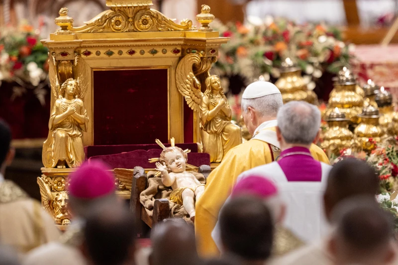 Full text: Pope Leo XIV’s Christmas night homily – #Catholic – 
 
 Pope Leo XIV venerates a statue of the Child Jesus during the celebration of Christmas Mass during the Night in St. Peter's Basilica on Dec. 24, 2025. / Credit: Daniel Ibanez/CNA.

Vatican City, Dec 24, 2025 / 17:31 pm (CNA).
Pope Leo XIV celebrated Christmas Mass during the Night in St. Peter’s Basilica on Wednesday. The Mass was attended by an estimated 6,000 people inside the basilica, while around 5,000 people gathered outside in St. Peter’s Square, according to the Vatican.Below is the full text of the pope’s Christmas night homily:Dear brothers and sisters,For millennia, across the earth, peoples have gazed up at the sky, giving names to the silent stars, and seeing images therein. In their imaginative yearning, they tried to read the future in the heavens, seeking on high for a truth that was absent below amidst their homes. Yet, as if grasping in the dark, they remained lost, confounded by their own oracles. On this night, however, “the people who walked in darkness have seen a great light; those who dwelt in a land of deep darkness, on them has light shined” (Is 9:2).Behold the star that astonishes the world, a spark newly lit and blazing with life: “To you is born this day in the city of David a Savior, who is the Messiah, the Lord” (Lk 2:11). Into time and space — in our midst — comes the One without whom we would not exist. He who gives his life for us lives among us, illuminating the night with his light of salvation. There is no darkness that this star does not illumine, for by its light all humanity beholds the dawn of a new and eternal life.It is the birth of Jesus, Emmanuel. In the Son made man, God gives us nothing less than his very self, in order to “redeem us from all iniquity and purify for himself a people of his own” (Titus 2:14). Born in the night is the One who redeems us from the night. The hint of the dawning day is no longer to be sought in the distant reaches of the cosmos, but by bending low, in the stable nearby.The clear sign given to a darkened world is indeed “a child wrapped in bands of cloth and lying in a manger” (Lk 2:12). To find the Savior, one must not gaze upward, but look below: the omnipotence of God shines forth in the powerlessness of a newborn; the eloquence of the eternalWord resounds in an infant’s first cry; the holiness of the Spirit gleams in that small body, freshly washed and wrapped in swaddling clothes. The need for care and warmth becomes divine since the Son of the Father shares in history with all his brothers and sisters. The divine light radiating from this Child helps us to recognize humanity in every new life.To heal our blindness, the Lord chooses to reveal himself in each human being, who reflect his true image, according to a plan of love begun at the creation of the world. As long as the night of error obscures this providential truth, then “there is no room for others either, for children, for the poor, for the stranger” (Benedict XVI, Homily, Christmas Mass during the Night, 24 December 2012).These words of Pope Benedict XVI remain a timely reminder that on earth, there is no room for God if there is no room for the human person. To refuse one is to refuse the other. Yet, where there is room for the human person, there is room for God; even a stable can become more sacred than a temple, and the womb of the Virgin Mary become the Ark of the New Covenant.Let us marvel, dear brothers and sisters, at the wisdom of Christmas. In the Child Jesus, God gives the world a new life: his own, offered for all. He does not give us a clever solution to every problem, but a love story that draws us in. In response to the expectations of peoples, he sends a childto be a word of hope. In the face of the suffering of the poor, he sends one who is defenseless to be the strength to rise again. Before violence and oppression, he kindles a gentle light that illumines with salvation all the children of this world. As Saint Augustine observed, “human pride weighedyou down so heavily that only divine humility could raise you up again” (Saint Augustine, Sermon 188, III, 3). While a distorted economy leads us to treat human beings as mere merchandise, God becomes like us, revealing the infinite dignity of every person. While humanity seeks to become “god” in order to dominate others, God chooses to become man in order to free us from every form of slavery. Will this love be enough to change our history?The answer will come as soon as we wake up from a deadly night into the light of new life, and, like the shepherds, contemplate the Child Jesus. Above the stable of Bethlehem, where Mary and Joseph watch over the newborn Child with hearts full of wonder, the starry sky is transformed into “a multitude of the heavenly host” (Lk 2:13). These are unarmed and disarming hosts, for they sing of the glory of God, of which peace on earth is the true manifestation (cf. v. 14). Indeed, in the heart of Christ beats the bond of love that unites heaven and earth, Creator and creatures.For this reason, exactly one year ago, Pope Francis affirmed that the Nativity of Jesus rekindles in us the “gift and task of bringing hope wherever hope has been lost,” because “with him, joy flourishes; with him, life changes; with him, hope does not disappoint” (Homily, Christmas Mass during the Night, 24 December 2024). With these words, the Holy Year began. Now, as the Jubilee draws to a close, Christmas becomes for us a time of gratitude and mission; gratitude for the gift received, and mission to bear witness to it before the world. As the Psalmist sings: “Tell of his salvation from day to day. Declare his glory among the nations, his marvelous deeds among all the peoples” (Ps 96:2–3).Brothers and sisters, contemplation of the Word made flesh awakens in the whole Church a new and true proclamation. Let us therefore announce the joy of Christmas, which is a feast of faith, charity and hope. It is a feast of faith, because God becomes man, born of the Virgin. It is a feast of charity, because the gift of the redeeming Son is realized in fraternal self-giving. It is a feast of hope, because the Child Jesus kindles it within us, making us messengers of peace. With these virtues in our hearts, unafraid of the night, we can go forth to meet the dawn of a new day.