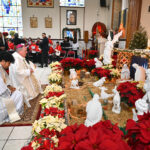 Paterson parish joyfully welcomes Bishop for Christmas Day Mass #Catholic - Bishop Kevin J. Sweeney celebrated the Nativity of the Lord on Christmas Day, Dec. 25, with a Mass at St. Therese Parish in Paterson, N.J.
BEACON PHOTOS | JOE GIGLI
 [See image gallery at beaconnj.org] 

Click here to subscribe to our weekly newsletter.