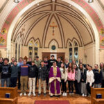 Teens raise early to shine God at Mendham parish #Catholic – On a recent Monday morning, D.J. Cerchio fought the urge to hit the snooze button so he could get up to attend 6:30 a.m. Mass before school. Cerchio, a sophomore at Mendham High School in New Jersey, is one of dozens of teenagers who gather monthly at St. Joseph Church in Mendham for the parish youth ministry’s 6:30 a.m. Mass followed by a communal breakfast of hot, fresh bagels.
It may seem counterintuitive to parents who’ve had to wake up a teenager for school, but the difficulty of getting up is a key part of the program’s success since its founding in 2013.
“I come to Mass and Bagels because it’s a challenge and the perfect start to my week. It isn’t easy to wake up early on a Monday and go to Mass, but it’s very rewarding,” Cerchio said.

Click here to subscribe to our weekly newsletter.

Mendham High School junior Max Krolikiewicz agrees: “I get up early so that I can start my day off with a clear head and the knowledge that I have God to guide me through the week.”
Mark Tosso, St. Joseph’s youth minister, said, “Our teens thirst for a Catholic faith that is demanding. They love the austere silence and calm of daily Mass, and the community and friendship that grows at breakfast afterwards.”
Mendham High School junior Ava Moynihan said, “I love starting my week off by spending time with the Lord as well as the amazing people who attend. I ultimately feel more at peace and less stressed for my busy week ahead when I make the sacrifice of waking up a little earlier.”
St. Joseph’s pastor, Msgr. Joseph Anginoli presides at the Masses in the parish’s historic chapel and is proud of how these teens are building habits of prayer and devotion. He said, “the faith commitment of our young people is extraordinary.” Msgr. Anginoli commended the teens for their witness and encouraged them in their determination to “live out your faith in a vibrant way at home, in school, and wherever you find yourself.”
Making the connection between our small sacrifices and Jesus’s sacrifice for us is a key element of Mass and Bagels.
“When we sacrifice comfort out of love for the Lord, we open our hearts to so much grace. And we need that grace to make it through the day ahead,” Tosso said.
Randolph High School senior Gavin Vetter said showing up “feels like starting the morning with a win, and the quiet, peaceful atmosphere of the Mass helps me center myself. When you start the week with a sacrifice out of love for God, it’s not hard to see his light in the world and his love around you after.”
&nbsp;