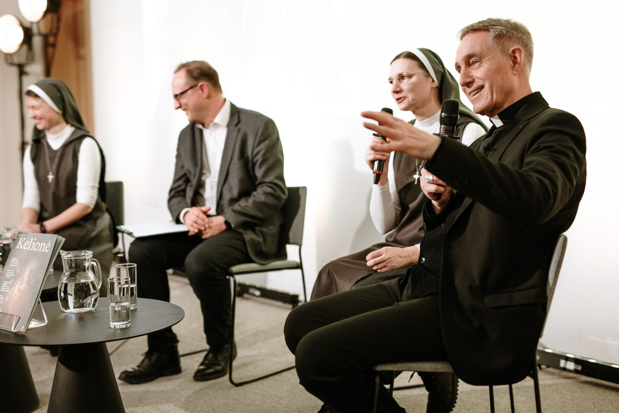 Gänswein says he prays to Benedict XVI, confirms hope for beatification cause – #Catholic – 
 
 Archbishop Georg Gänswein speaks at an event hosted by the Catholic magazine Kelionė at the Lithuanian National Library in Vilnius, Lithuania, on Jan. 7, 2026. | Credit: L. Macevicienes/Zurnalaskelione.lt

Jan 11, 2026 / 10:32 am (CNA).
Archbishop Georg Gänswein, the apostolic nuncio to the Baltic states and longtime personal secretary to Pope Benedict XVI, said he now prays not for but to the late pontiff, asking for his intercession, and expressed hope the beatification cause will open soon.Speaking at an event hosted by the Catholic magazine Kelionė at the Lithuanian National Library on Jan. 7, Gänswein offered personal reflections on his new diplomatic mission, the celebration of Christmas in Lithuania, and his decades-long collaboration with Joseph Ratzinger.“I come from the most beautiful part of Germany, but I have lived in Rome for most of my life,” Gänswein said. “As a bonus and thanks for all my work, I received an assignment to work in the Baltic states,” he said jovially.Asked about differences between Christmas in Rome and in the Baltic region, the archbishop answered with characteristic humor: “I celebrated Christmas in Rome for 28 years, and in Vilnius for two. The first difference is the cold.” He added that Lithuania’s seasonal displays left a strong impression, drawing attention to “very beautiful Christmas decorations,” and saying the Christmas trees “are very beautiful, maybe even more beautiful than in St. Peter’s Square, in the Vatican.”Gänswein also expressed gratitude that the celebration of Christ’s birth in Lithuania is not merely cultural or superficial. He said he has sensed a reverence in which “its depth is felt here,” pointing to a faith that remains attentive to the mystery at the heart of the season.During the conversation, the nuncio returned to the influence of Benedict XVI, describing his years beside Ratzinger as a gift of divine providence.“All the years of cooperation together have left an indelible experience,” he said. “It was not only intellectual and theological formation, but also formation of the heart, soul, and everything that we can call life.”Gänswein recalled to the audience that his first encounter with Ratzinger came when he was still a young seminarian, reading the future pope’s articles and books while Ratzinger was a professor in Germany. “I tried to read and study all of his writings,” he said, explaining that he came to see Ratzinger not only as a theologian and academic, but as “a man full of faith and intelligence."After his priestly ordination in 1984, Gänswein served as an assistant parish priest before continuing his studies. He later completed doctoral work and eventually arrived in Rome, where he first met Ratzinger while the cardinal was serving as prefect of the Dicastery for the Doctrine of the Faith. Gänswein said Ratzinger invited him into collaboration, an invitation he regards as mysterious and grace filled.“What did he call me for? I don’t know,” he said, “but I see it as a great gift of Providence.” In 2003, he added, he became Ratzinger’s personal secretary.Speaking of Benedict XVI after the late pope’s death, Gänswein made a striking remark about prayer and spiritual closeness: “And now, when Pope Benedict XVI has departed to be with the Lord, I notice that I do not pray so much for him, but to him, asking for his help.” He said there were moments, including during his service in the Baltics, when he found himself asking for Benedict’s intercession.At the same time, he stressed the Church’s caution regarding sainthood causes. “The Church is a very wise and very prudent mother,” he said, noting that in beatification causes she is “twice wise and twice prudent,” and that time must pass to discern whether public esteem reflects genuine holiness rather than passing fame.In a December 2025 interview with German Catholic television network K-TV, Gänswein said, “Personally, I have great hopes that this process will be opened.” The interview aired shortly before a private audience he held with Pope Leo XIV during a discreet mid-December visit to Rome.The Kelionė gathering also featured talks from other invited speakers. Educator Vytautas Toleikis, who works as a moral education teacher at Vilnius St. Christopher Gymnasium, is the founder of the informal education group “Walkers.” He described taking students on weekly walks around Vilnius to encounter people he personally admires. He said the goal is to broaden students’ horizons through lived encounters with kindness and human warmth, adding that these meetings often surprise him as much as they do the young people.Singer Sasha Song, who represented Lithuania at the 2009 Eurovision, shared a brief personal testimony about his struggle with addiction and the transformation he experienced after rehabilitation. He said the experience taught him to value life differently, describing his current state as one marked by gratitude and a renewed sense of happiness.Prof. Robertas Badaras, a toxicologist with four decades of experience, reflected on how substance abuse has changed since the Soviet period. He noted that while alcohol once dominated, society now confronts an expanding array of substances, including a vast number of hallucinogens and stimulants.Actress Justė Liaugaudė, representing the “Red Noses Clown Doctors,” spoke about offering emotional support to patients of all ages, especially those who struggle to find joy amid illness. She described how the organization’s presence has expanded in clinical settings, including, she said, being the only non-medical personnel permitted to accompany children into operating rooms — a reminder that compassion can reach where words and medicine sometimes cannot.For Gänswein, however, the evening’s most enduring note returned to what he called the quiet, lifelong schooling he received at Benedict’s side, a formation not only of the mind, but of the whole person and the conviction that gratitude, faith, and truth are never merely ideas, but realities meant to be lived.