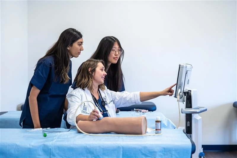 How a Catholic university is combating the health care crisis in Maryland #Catholic 
 
 Mount St. Mary’s University Physician Assistant Program Director Mary Jackson, MMS, PA-C, CAQ-EM, demonstrates hands-on ultrasound techniques with students at Mount St. Mary’s University in Emmitsburg, Maryland. / Credit: Photo courtesy of Mount St. Mary’s University

CNA Staff, Jan 3, 2026 / 06:00 am (CNA).
In response to Maryland’s growing health care crisis, Mount St. Mary’s University is launching a physician assistant program later this month.&nbsp;The private Catholic liberal arts university, located in Emmitsburg, Maryland, is partnering with the Daughters of Charity — the religious order founded by St. Elizabeth Ann Seton — to bring more students into the field of health care.Exterior view of the new Timothy E. Trainor School of Health Professions at Mount St. Mary’s University in Emmitsburg, Maryland. Credit: Photo courtesy of Mount St. Mary’s UniversityAmid a staffing shortage, Maryland has had the longest emergency room wait times in the nation for nine years, averaging more than four hours. The number of serious medical mistakes that have resulted in death or severe disability for patients has risen each year in Maryland for the past four years, according to a report published in September 2025.A recent projection found that Maryland needs to increase the number of primary physicians by 23% by 2030 to cover the gap in primary care providers.The Maryland Department of Health has cited staffing shortages — among several causes of rising medical errors — as something that Mount St. Mary’s program hopes to mitigate.Ndidi Nwokorie, MBBS, FAAP, medical director of the Mount St. Mary’s physician assistant program, works one-on-one with a PA student. Credit: Photo courtesy of Mount St. Mary’s UniversityThe program — part of the college’s recent move into the health care arena — will welcome its inaugural class of 43 students on Jan. 20.The school’s new program includes resources for students to prevent burnout through its Center for Clinician Well-Being.CNA spoke with physician assistant program director Mary Jackson about the new program.Kevin Richardson, MSPAS, PA-C, director of assessments for the physician assistant program, leads a classroom lecture. Credit: Photo courtesy of Mount St. Mary’s UniversityCNA: What inspired the launch of the new physician assistant program?&nbsp;Mary Jackson: The Mount made a very intentional decision to enter the health care education arena as another way to live out our mission. As a Catholic university, Mount St. Mary’s graduates ethical leaders who are inspired by a passion for learning and who lead lives of significance in service to God and others.&nbsp;Preparing future health care clinicians is a natural extension of this mission, one that allows our students to serve individuals, families, and communities at moments of greatest vulnerability.&nbsp;We chose to launch a physician assistant program because the PA profession consistently ranks among the top careers nationally, with strong student interest and growing workforce demand.&nbsp;With a growing health care shortage in Maryland, how do you hope this program will address this crisis?&nbsp;&nbsp;Maryland, like much of the country, is experiencing a significant health care workforce shortage, marked by long wait times, limited access in rural and underserved areas, and an aging population with increasing medical needs.Physician assistants play a vital role in expanding access to high-quality care. By educating future PAs who are clinically excellent, compassionate, and mission-driven, our program aims to strengthen Maryland’s health care workforce and ensure that more patients receive timely, patient-centered care.Associate Program Director Leanne Hedges, MMS, PA-C, demonstrates a comprehensive physical examination as part of clinical training for PA students. Credit: Photo courtesy of Mount St. Mary’s UniversityHow does your mission as a Catholic university drive the physician assistant program?&nbsp;Our Catholic identity shapes every aspect of the physician assistant program. The Mount’s commitment to service, compassion, equity, and well-being calls us to prepare clinicians who go beyond transactional medicine.We aim to form PAs who care deeply for all patients, especially those who are underserved, while also tending to their own well-being so they can flourish long term in their calling to health care.How did Mount St. Mary’s work with the Daughters of Charity to build this program?&nbsp;&nbsp;&nbsp;The Daughters of Charity have been extraordinary partners in bringing this vision to life. Their legacy of caring for the poor and vulnerable has inspired the program’s mission and helped us ground our work in the values of humility and loving service.The Daughters have generously provided both tangible and in-kind support, enabling our inspiring facility, helping fund our Care for America scholarships, and working with us as thought leaders in this work.
