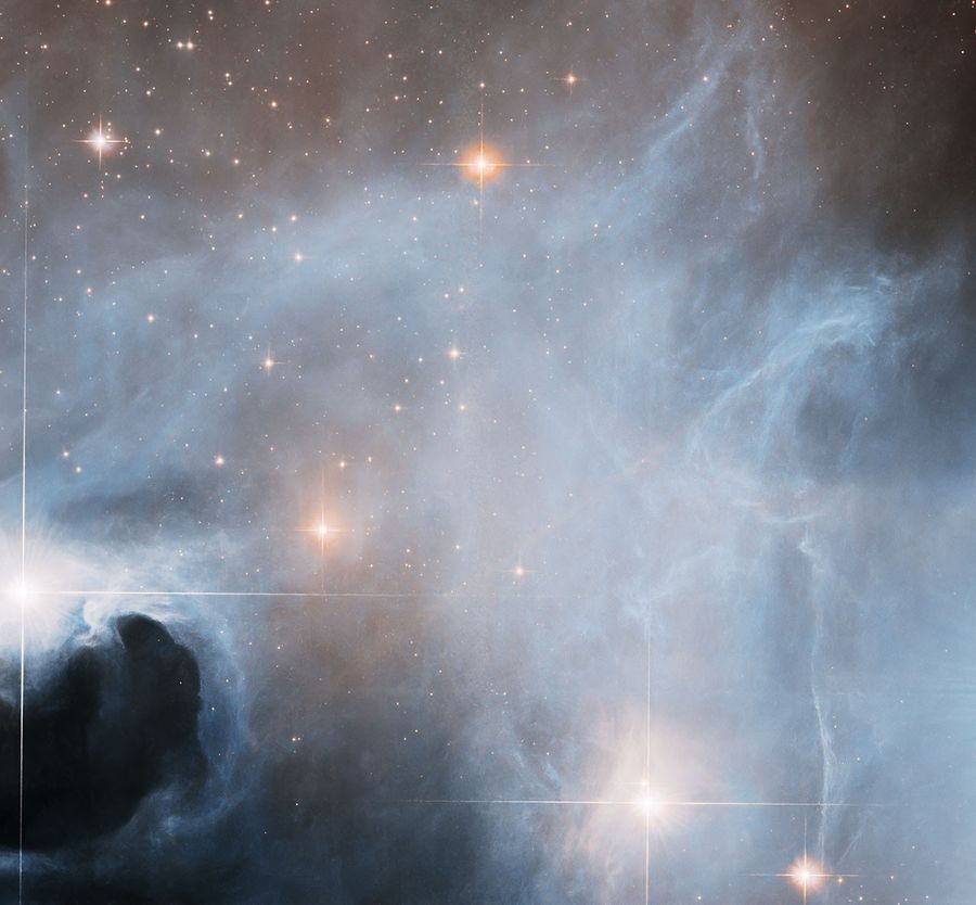 Hubble Observes Ghostly Cloud Alive with Star Formation – A seemingly serene landscape of gas and dust is hopping with star formation behind the scenes. Hubble Observes Ghostly Cloud Alive with Star Formation – A seemingly serene landscape of gas and dust is hopping with star formation behind the scenes.