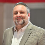 New Madison evangelization center head pledges to advance mission #Catholic – John Cammarata wants to make it his mission as the new executive director of St. Paul Inside the Walls at Bayley-Ellard in Madison, N.J., to promote even more widely the Catholic evangelization center’s already dynamic mission: to invite all people to explore a life of faith and inspire them to live that life as missionary disciples of Christ.
In an email last week to the community of the Paterson Diocese in New Jersey, Msgr. T. Mark Condon, diocesan vicar general and moderator of the Curia, announced the appointment of Cammarata, 48, as St. Paul’s executive director on behalf of Bishop Kevin J. Sweeney. Cammarata started his new position on Jan. 5. He oversees the staff and operations of the Office of Evangelization at St. Paul’s with Father Paul Manning, diocesan vicar for evangelization and vicar for education.
Cammarata comes to St. Paul’s with more than 20 years of experience in youth ministry and catechetical formation. He will continue his duties as diocesan youth ministry director, a post he has held since 2022. Until his appointment to St. Paul’s, he served for 25 years in many capacities as a pastoral minister at St. Peter the Apostle Parish in Parsippany, N.J., most recently as youth minister and religious education coordinator.

Click here to subscribe to our weekly newsletter.

“I’m excited. As executive director, I want to continue the great work of the center, and over time, implement other programs or initiatives that I think might benefit the diocesan Catholic community,” Cammarata said. He also views his new position as a way to utilize the master’s degree in Church management he earned from Villanova University in Villanova, Penn., in 2022. “I also want to get out to every corner of the diocese to reach every parish — their pastors and staff —to encourage their faithful to take advantage of what St. Paul’s has to offer,” he said.
As executive director, Cammarata succeeds Brian Honsberger, who was a St. Paul’s staff member for 15 years and also served as diocesan director of mission and technology integration. He was also the administrator of the diocesan Certificate in Catholic Evangelization (CCE) program, and started the Paul Street Journal podcast with Freddy Garcia, associate diocesan coordinator of evangelization and a campus minister.
Cammarata’s responsibilities will include organizational leadership; programming and scheduling; oversight and management of the budget, finances, and facilities; conducting and/or cooperating with diocesan initiatives, programs, and events; staff development; and mission and technology integration. His duties also include continued partnering with Immaculate Conception Seminary at Seton Hall University in South Orange, N.J., and St. Elizabeth University in the Convent Station neighborhood of Morris Township, N.J.
St. Paul’s was founded by Bishop Emeritus Arthur J. Serratelli, who dedicated the center in 2010 as a training center for evangelization, equipping Catholic leaders to share their faith with others. The center is home to several ministries and offices, including Youth Ministry, Campus Ministry, Young Adult Ministry, Hispanic Ministry, and the Office of Catechesis.
“Within these walls, through conversation and community, self-discovery and shared mission, we try to inspire people of all ages, beliefs, cultures, perspectives, and professions to engage in the quest for truth, for meaning, and for God,” according to St. Paul’s website.
As diocesan youth minister, Cammarata and his office have provided tools, training, and support to help youth ministers build their programs and make the best possible impact on the youth, and have held activities to help local youth deepen their faith. He helped the diocese, parishes, and schools restart their youth programs that had closed during COVID-19. Cammarata also revived the annual diocesan Youth Conference, started annual regional youth retreats, and formed a Diocesan Youth Leadership Team to help plan activities.
Cammarata is the happy and proud husband of Veronica and father of Raymond and Lindsey. He sees a link between his work in youth ministry and at St. Paul’s.
“Being Catholic involves lifelong formation from childhood and throughout adulthood,” said Cammarata, taking note of St. Paul’s wide variety of programs, which offer “formation for everyone.”
Click here for information about St. Paul Inside the Walls.
&nbsp;