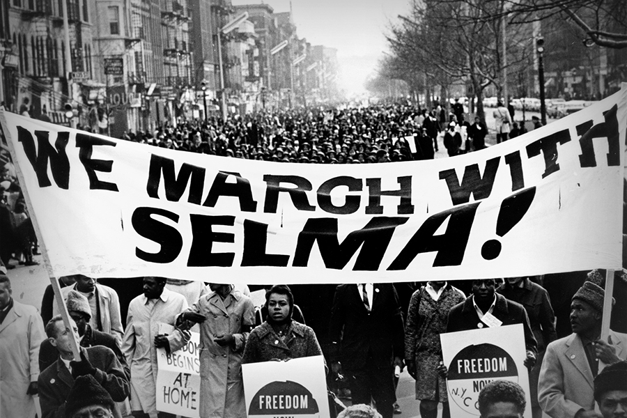 The nuns who witnessed the life and death of Martin Luther King Jr. – #Catholic – 
 
 We March with Selma event. | Credit: Via Flickr CC BY NC 2.0

Jan 19, 2026 / 04:00 am (CNA).
Sister Mary Antona Ebo was the only Black Catholic nun who marched with civil rights leader Martin Luther King Jr. in Selma, Alabama, in 1965.“I’m here because I’m a Negro, a nun, a Catholic, and because I want to bear witness,” Ebo said to fellow demonstrators at a March 10, 1965, protest attended by King.The protest took place three days after the “Bloody Sunday” clash, where police attacked several hundred voting rights demonstrators with clubs and tear gas, causing severe injuries among the nonviolent marchers.Sister Mary Antona Ebo died Nov. 11, 2017, in Bridgeton, Missouri, at the age of 93, the St. Louis Review reported at the time.After the “Bloody Sunday” attacks, King had called on church leaders from around the country to go to Selma. Archbishop Joseph E. Ritter of St. Louis asked his archdiocese’s human rights commission to send representatives, Ebo recounted to the St. Louis Post-Dispatch in 2015.Ebo’s supervisor, also a religious sister, asked her whether she would join a 50-member delegation of laymen, Protestant ministers, rabbis, priests, and five white nuns.Just before she left for Alabama, she heard that a white minister who had traveled to Selma, James Reeb, had been severely attacked after he left a restaurant and later died from his injuries.At the time, Ebo said, she wondered: “If they would beat a white minister to death on the streets of Selma, what are they going to do when I show up?”In Selma on March 10, Ebo went to Brown Chapel African Methodist Episcopal Church, joining local leaders and the demonstrators who had been injured in the clash.“They had bandages on their heads, teeth were knocked out, crutches, casts on their arms. You could tell that they were freshly injured,” she told the Post-Dispatch. “They had already been through the battleground, and they were still wanting to go back and finish the job.”Many of the injured were treated at Good Samaritan Hospital, run by Edmundite priests and the Sisters of St. Joseph, the only Selma hospital that served Blacks. Since their arrival in 1937, the Edmundites had faced intimidation and threats from local officials, other whites, and even the Ku Klux Klan, CNN reported.The injured demonstrators and their supporters left the Selma church, with Ebo in front. They marched toward the courthouse, then were blocked by state troopers in riot gear. She and other demonstrators knelt to pray the Our Father before they agreed to turn around.Despite the violent interruption, the 57-mile march drew 25,000 participants. It concluded on the steps of the state capitol in Montgomery with King’s famous March 25 speech against racial prejudice.“How long? Not long, because the arc of the moral universe is long, but it bends toward justice,” King said.King would be dead within three years. On a fateful April 4, 1968, he was shot by an assassin at a Memphis hotel.He had asked to be taken to a Catholic hospital should anything happen to him, and he was taken to St. Joseph Hospital in Memphis. At the time, it was a nursing school combined with a 400-bed hospital.There, too, Catholic religious sisters played a role.Sister Jane Marie Klein and Sister Anna Marie Hofmeyer recounted their story to The Paper of Montgomery County Online in January 2017.The Franciscan nuns were walking around the hospital grounds when they heard the sirens of an ambulance. One of the sisters was paged three times, and they discovered that King had been shot and taken to their hospital.The National Guard and local police locked down the hospital for security reasons as doctors tried to save King.“We were obviously not allowed to go in when they were working with him because they were feverishly working with him,” Klein said. “But after they pronounced him dead we did go back into the ER. There was a gentleman as big as the door guarding the door and he looked at us and said, ‘You want in?’ We said yes, we’d like to go pray with him. So he let the three of us in, closed the door behind us, and gave us our time.”Hofmeyer recounted the scene in the hospital room. “He had no chance,” she said.Klein said authorities delayed the announcement of King’s death to prepare for riots they knew would result.Three decades later, Klein met with King’s widow, Coretta Scott King, at a meeting of the Catholic Health Association Board in Atlanta where King was a keynote speaker. The Franciscan sister and the widow of the civil rights leader told each other how they had spent that night.Klein said being present that night in 1968 was “indescribable.”“You do what you got to do,” she said. “What’s the right thing to do? Hindsight? It was a privilege to be able to take care of him that night and to pray with him. Who would have ever thought that we would be that privileged?”She said King’s life shows “to some extent one person can make a difference.” She wondered “how anybody could listen to Dr. King and not be moved to work toward breaking down these barriers.”Klein would serve as chairperson of the Franciscan Alliance Board of Trustees, overseeing support for health care. Hofmeyer would work in the alliance’s archives. In 2021, both were living at the Provinciate at St. Francis Convent in Mishawaka, Indiana.For her part, after Selma, Ebo would go on to serve as a hospital administrator and a chaplain.In 1968 she helped found the National Black Sisters’ Conference. The woman who had been rejected from several Catholic nursing schools because of her race would serve in her congregation’s leadership as it reunited with another Franciscan order, and she served as a director of social concerns for the Missouri Catholic Conference.She frequently spoke on civil rights topics. When controversy erupted over a Ferguson, Missouri, police officer’s killing of Michael Brown, a Black man, she led a prayer vigil. She thought the Ferguson protests were comparable to those of Selma.“I mean, after all, if Mike Brown really did swipe the box of cigars, it’s not the policeman’s place to shoot him dead,” she said.Archbishop Robert J. Carlson of St. Louis presided at her requiem Mass in November 2021, saying in a statement: “We will miss her living example of working for justice in the context of our Catholic faith.”A previous version of this story was first published on Catholic News Agency on Jan. 17, 2022.