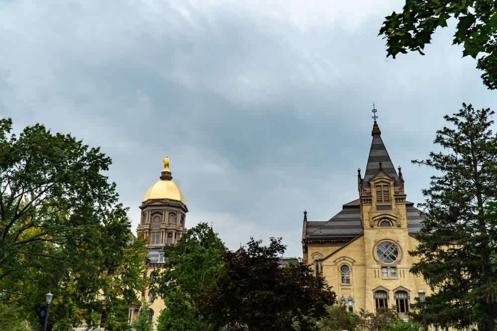 Amid criticism by bishops, Notre Dame says pro-abortion professor ‘well prepared’ to lead institute #Catholic The University of Notre Dame is signaling that it will stick by its appointment of an outspoken pro-abortion advocate to lead a university institute even after bishops from around the U.S. have criticized the decision and urged the school to change course.Multiple bishops have lamented the school’s decision to appoint global affairs Professor Susan Ostermann as director of the school’s Liu Institute for Asia and Asian Studies. The school announced the appointment in January.On Feb. 11 Fort Wayne-South Bend, Indiana, Bishop Kevin Rhoades, whose diocesan territory includes the university, expressed “dismay” and “strong opposition” to the appointment and called on the school to rescind the assignment, citing Ostermann’s public support for abortion.Several of Rhoades’ brother bishops followed suit, commending Rhoades for his statement and similarly calling on the university to reverse course on Ostermann’s appointment.Yet in a Feb. 13 statement to EWTN News, the school indicated that it would not pull Ostermann’s nomination to the leadership post.Ostermann “is a highly regarded political scientist and legal scholar whose insightful research on regulatory compliance … demonstrates the rigorous, interdisciplinary expertise required to lead the Liu Institute,” the school said.Calling Ostermann a “deeply committed educator,” the school said she is “well prepared to expand the institute’s global partnerships and create impactful research opportunities that advance our dedication to serving as the preeminent global Catholic research institution.”The university stressed its “unwavering” commitment “to upholding the inherent dignity of the human person and the sanctity of life at every stage.”“Those who serve in leadership positions at Notre Dame do so with the clear understanding that their decision-making as leaders must be guided by and consistent with the university’s Catholic mission,” the school said.The school did not immediately respond when asked for direct confirmation that it was continuing with Ostermann’s appointment to lead the Liu Institute.But its statement suggested the school is not backing down from the controversial decision, one that has brought withering criticism from both U.S. bishops and pro-life advocates and has seen the departure of at least two academics from the storied Catholic institution.Robert Gimello, a research professor emeritus of theology who is an expert on Buddhism, told the National Catholic Register that his “continued formal association with a unit of the university led by such a person is, for me, simply unconscionable.”Diane Desierto, a professor of law and of global affairs, also told the Register that she had cut ties with the institute over the appointment.Ostermann’s outspoken abortion advocacy has included instances where she has linked the pro-life movement to white supremacy and misogyny.The professor told the National Catholic Register in January that she “respect[s] Notre Dame’s institutional position on the sanctity of life at every stage” and described herself as “inspired by the university’s focus on integral human development, which calls us to promote the dignity and flourishing of every person.”She told the Register that her role at the school “is to support the diverse research of our scholars and students, not to advance a personal political agenda.”Ostermann had no further comment beyond her earlier statement, according to a university spokesperson.