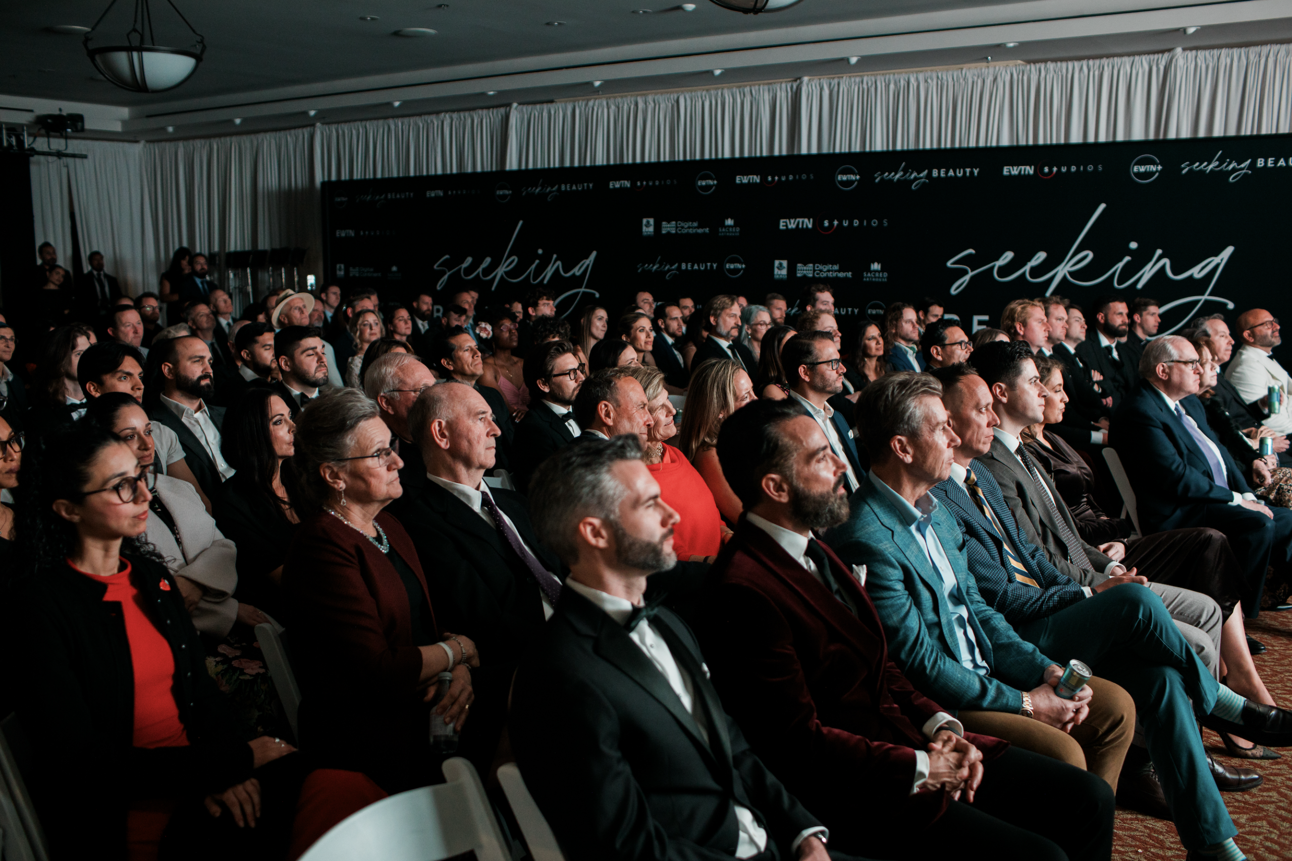 EWTN+ docuseries ‘Seeking Beauty’ aims to point viewers to the divine through beauty #Catholic EWTN+ recently launched “Seeking Beauty,” a first-of-its-kind adventure documentary series that explores culture, architecture, food, art, and music, and aims to point viewers to the beautiful — and ultimately to the divine.The show’s host, David Henrie, who is best known for his role as Justin Russo on Disney’s “Wizards of Waverly Place,” believes a show like this is needed right now as more and more people are searching for authentic, human experiences.“We live in such a fast-paced society. Things are moving at 24, 30 frames a second. And then AI is on the horizon. We’re just getting inundated with so much,” Henrie told EWTN News on the red carpet at the premiere of the series on Jan. 16. “I think there’s this deep craving for the human, for the real, for the natural.”The Catholic actor explained he believes that in order to provide authentic experiences, “you should go back and revisit cultures who have done beauty in a magnificent way — and there’s always a theological component to it.”He added: “Beauty to me is the language of the divine. It’s a fingerprint of God. And I think it’ll continue to be more and more attractive the more society gets sucked into our devices. I think you’re seeing a big rejection of that, so I think the timing is perfect for a show on beauty.”
“Seeking Beauty” is screened during its premiere in Los Angeles on Jan. 16, 2026. | Credit: Grant Whitty
Peter Gagnon, president of EWTN Studios, and EWTN CEO Michael Warsaw highlighted EWTN’s desire to offer content portraying beauty through the faith and God’s creation.“EWTN has always wanted to present beauty. God is beautiful. His creation is beautiful, and there are many areas that you can see the divine in beauty,” Gagnon shared. “So this series, when the concept was brought to us, fit in exactly with our new content strategy because it leads the viewer in that journey along with David. It’s not David telling you. You’re journeying with David to find beauty.”Warsaw added: “For us, with all we do at EWTN, it’s really about introducing people to the beauty, the truth, the goodness of our faith as Catholics. So clearly this series about beauty that engages people with understanding, and being exposed to beauty in various forms — through the arts, through music, through culture — all of these things that really the Church has always been a patron of though the centuries and to bring that into this current moment so that people can really develop a deeper relationship with Our Lord, a deeper connection to the faith, a deeper connection to the Church.”Henrie said he hopes viewers will be left “curious about beauty and invite it into your life more.”“I think that even if you have a strong faith, especially growing up in America, beauty is not a part of the conversation. It’s something superfluous, it’s a cost that can be cut, but God never cut beauty,” he said. “Learning about the old world and how they saw beauty will hopefully inspire you to bring it into your soul most importantly.”Gagnon echoed Henrie’s sentiments in that he said he hopes viewers will be led to reflect on what they see in the show and to “not just see the beauty that they’re watching on the screen but to then go back home and to see the beauty around them in their lives, a beauty they may not have seen or not realized it was there, and through seeing that and being inspired by that, be led to the divine.”“Seeking Beauty” is available to watch exclusively on EWTN+, a free digital streaming platform that offers faith-based content. EWTN+ is available on RokuTV, GoogleTV, AppleTV, AmazonFireTV, and on EWTN.com. EWTN+ docuseries ‘Seeking Beauty’ aims to point viewers to the divine through beauty #Catholic EWTN+ recently launched “Seeking Beauty,” a first-of-its-kind adventure documentary series that explores culture, architecture, food, art, and music, and aims to point viewers to the beautiful — and ultimately to the divine.The show’s host, David Henrie, who is best known for his role as Justin Russo on Disney’s “Wizards of Waverly Place,” believes a show like this is needed right now as more and more people are searching for authentic, human experiences.“We live in such a fast-paced society. Things are moving at 24, 30 frames a second. And then AI is on the horizon. We’re just getting inundated with so much,” Henrie told EWTN News on the red carpet at the premiere of the series on Jan. 16. “I think there’s this deep craving for the human, for the real, for the natural.”The Catholic actor explained he believes that in order to provide authentic experiences, “you should go back and revisit cultures who have done beauty in a magnificent way — and there’s always a theological component to it.”He added: “Beauty to me is the language of the divine. It’s a fingerprint of God. And I think it’ll continue to be more and more attractive the more society gets sucked into our devices. I think you’re seeing a big rejection of that, so I think the timing is perfect for a show on beauty.”
“Seeking Beauty” is screened during its premiere in Los Angeles on Jan. 16, 2026. | Credit: Grant Whitty
Peter Gagnon, president of EWTN Studios, and EWTN CEO Michael Warsaw highlighted EWTN’s desire to offer content portraying beauty through the faith and God’s creation.“EWTN has always wanted to present beauty. God is beautiful. His creation is beautiful, and there are many areas that you can see the divine in beauty,” Gagnon shared. “So this series, when the concept was brought to us, fit in exactly with our new content strategy because it leads the viewer in that journey along with David. It’s not David telling you. You’re journeying with David to find beauty.”Warsaw added: “For us, with all we do at EWTN, it’s really about introducing people to the beauty, the truth, the goodness of our faith as Catholics. So clearly this series about beauty that engages people with understanding, and being exposed to beauty in various forms — through the arts, through music, through culture — all of these things that really the Church has always been a patron of though the centuries and to bring that into this current moment so that people can really develop a deeper relationship with Our Lord, a deeper connection to the faith, a deeper connection to the Church.”Henrie said he hopes viewers will be left “curious about beauty and invite it into your life more.”“I think that even if you have a strong faith, especially growing up in America, beauty is not a part of the conversation. It’s something superfluous, it’s a cost that can be cut, but God never cut beauty,” he said. “Learning about the old world and how they saw beauty will hopefully inspire you to bring it into your soul most importantly.”Gagnon echoed Henrie’s sentiments in that he said he hopes viewers will be led to reflect on what they see in the show and to “not just see the beauty that they’re watching on the screen but to then go back home and to see the beauty around them in their lives, a beauty they may not have seen or not realized it was there, and through seeing that and being inspired by that, be led to the divine.”“Seeking Beauty” is available to watch exclusively on EWTN+, a free digital streaming platform that offers faith-based content. EWTN+ is available on RokuTV, GoogleTV, AppleTV, AmazonFireTV, and on EWTN.com.