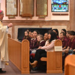 Grateful Hawthorne students help close Catholic Schools Week strong #Catholic - St. Anthony School in Hawthorne, N.J., on Feb. 1 marked the conclusion of Catholic Schools Week (CSW) with a Mass that Bishop Kevin J. Sweeney celebrated in St. Anthony Church.
“The ‘Opening Mass’ for Catholic Schools Week at St. Anthony Church in Hawthorne had to be rescheduled from last Sunday [Jan. 25] (because of the snowstorm) to today and became the Closing Mass for CSW,” Bishop Sweeney posted after the Mass on Feb. 1 on social media. “It was wonderful to see so many students, parents, and parishioners ‘up and out’ early on a cold morning to get to the 8:30 [a.m.] Mass!”

Click here to subscribe to our weekly newsletter.

Father Stephen Prisk, pastor of St. Anthony Parish, and Father Brendon Harfmann, the parish’s parochial vicar, concelebrated the Mass. Students of St. Anthony’s also participated in the liturgy. The Knights of Columbus presented Salesian Sister Mary Jackson, the principal, with a check for the school from proceeds they raised during their “Keep Christ in Christmas” magnet sale.
“Thanks to Father Stephen Prisk, Sister Mary Jackson, the school, and parish community for such a warm welcome!” Bishop Sweeney added on social media.
BEACON PHOTOS | JOE GIGLI
 [See image gallery at beaconnj.org]