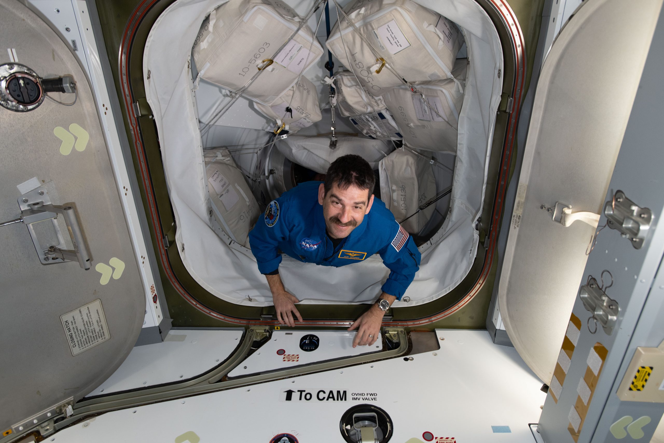 Making an Entrance – NASA astronaut and SpaceX Crew-12 Pilot Jack Hathaway enters the International Space Station after docking aboard the Dragon spacecraft to join Expedition 74 and begin a long-duration microgravity research mission.