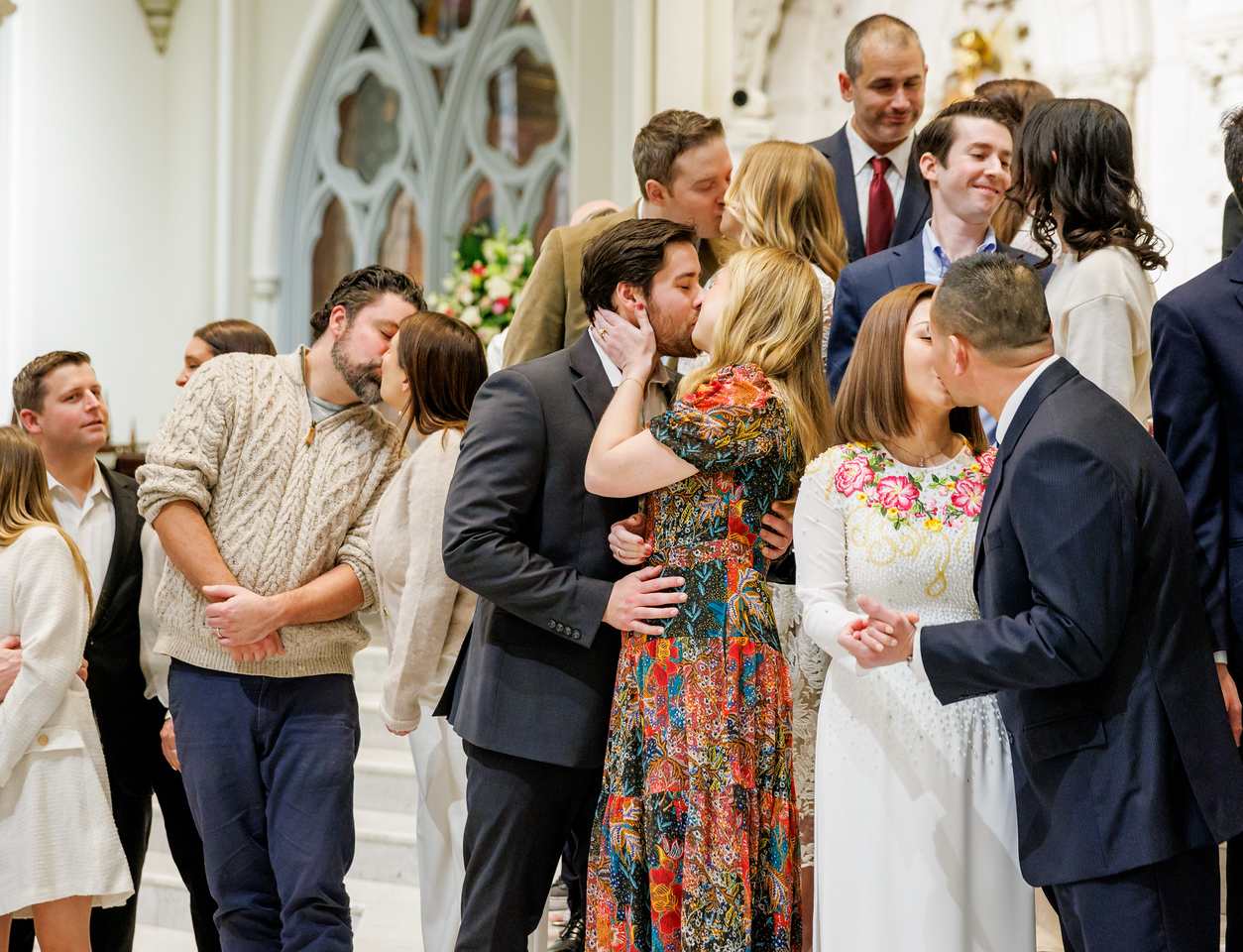 On Valentine’s Day, Boston Archdiocese welcomes marriages into Church with convalidation ceremony - #Catholic - About two dozen couples in the Archdiocese of Boston will have their marriages “brought into the Church” this year, part of a now-yearly tradition there in which husbands and wives can take part in “convalidation” ceremonies. Convalidation offers civilly married husbands and wives the opportunity for a valid Catholic sacramental marriage. The Boston Archdiocese describes the ceremony as “an opportunity for couples married outside of the Catholic Church to enter a marriage covenant in the Catholic tradition, be strengthened by God’s grace, and be supported by his Church.”
 
 Couples celebrate the convalidation of their marriages in the Archdiocese of Boston on Saturday, Feb. 8, 2025. | Credit: Gregory Tracy/Archdiocese of Boston
 
 Liz Cotrupi, the director of family life and ecclesial movements in the archdiocesan evangelization office, told EWTN News that this year’s ceremony will be the third the archdiocese has held in as many years. “We’ve been doing it during National Marriage Week,” she said. “It just so happens that this year it falls on Valentine’s Day, so it’s a little special.”The program arose in Boston when former Regional Bishop Mark O’Connell began offering convalidation ceremonies in the north region of the archdiocese over which he presided. “When he became the vicar general [in 2023], he said, ‘Hey I’ve been doing this regionally in the north region and it’s had some good feedback — what about doing it archdiocesan-wide?’” Cotrupi said. The program has grown ever since. “We’ll probably have 22 to 24 couples this year,” Cotrupi said. The archdiocese has advertised the ceremony in parish bulletins and on social media, she said, and the reaction has been positive. “People are coming out of the woodwork,” she said. 
 
 A couple receives convalidation of their marriage by Bishop Mark O’Connell in the Archdiocese of Boston on Saturday, Feb. 8, 2025. | Credit: Gregory Tracy/Archdiocese of Boston
 
 The process is similar, but not identical, to that of preparing couples for marriage. “We’ve learned a lot through this process,” Cotrupi said with a laugh. The archdiocesan canonical affairs office takes part in the marriage preparation, she said, while a priest helps prepare the couple directly. “Each couple, it’s as if they’re making their vows for the very first time,” she said. “They will exchange consent, answer the questions, and then exchange rings, which are blessed.” 
 
 “Each couple, it’s as if they’re making their vows for the very first time.”
 
 Liz CotrupiDirector of Family Life and Ecclesial Movements, Archdiocese of Boston
 
 
 The ceremony is not a full Mass, she said, but rather consists of the Liturgy of the Word, the prayers of the faithful, a blessing, and the marriage ceremony itself. The event often has all the trappings of a wedding, she said. “Some brides come dressed in wedding dresses,” she said. Others are dressed more casually. Some families bring their children. 
 
 Young guests attend a convalidation ceremony in the Archdiocese of Boston on Saturday, Feb. 8, 2025. | Credit: Gregory Tracy/Archdiocese of Boston
 
 At times, Cotrupi said, couples forget to bring the required two witnesses to the event, in which case she and archdiocesan Family Life Consultant Emily Elliott have often stood as witnesses. Couples are often given a gift on the day of the ceremony, she said, and afterward they often go out to dinner with family and friends to celebrate. Cotrupi said the usual administrative tasks surrounding the process, like “all the paperwork,” can be “a bit much.” Still, she said, “it’s a joyous occasion.”“We’re so happy to do it for them,” she said.