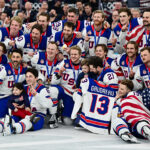 Team USA’s hockey gold honors Catholic hockey star tragically killed with brother in 2024 #Catholic – (OSV News) — When the U.S. men’s hockey team dramatically captured its first Olympic gold medal in 46 years at the 2026 Winter Games Feb. 22 in Milan, Italy, the triumph was defined not only by athletic achievement but by remembrance and faith.
After the dramatic 2-1 overtime thriller over Canada, U.S. captain Auston Matthews and teammates skated around the ice holding the late Johnny Gaudreau’s No. 13 jersey, ensuring that a beloved player — gone too soon — was at the forefront of their celebration.
Johnny Gaudreau, widely known as “Johnny Hockey,” and his brother Matthew were killed Aug. 29, 2024, when they were struck by an alleged drunk driver while cycling near Salem County, New Jersey, on the eve of their sister’s wedding. Johnny was 31.
Before the Olympics began, the Gaudreau family issued a heartfelt message that underscored Gaudreau’s lifelong dream to represent his country.

Click here to subscribe to our weekly newsletter.

“Representing Team USA at the Olympics was one of his greatest dreams,” the family wrote, noting that in his final summer Johnny was training harder than ever to earn a spot on the Olympic roster. “We know he will be so very present with Team USA and all of his close friends competing throughout these games … John loved this game and loved representing his country.”
Both Gaudreau brothers were hockey standouts. Both played for Boston College. Matthew competed professionally and later became involved in coaching at his high school alma mater, but he never played in the NHL. Johnny, however, played 11 seasons in the NHL — nine with the Calgary Flames and, desiring to be closer to home, his final two with the Columbus Blue Jackets.
Gaudreau’s Catholic faith was a central part of his life from his youth through his professional career. He and his brother both attended Gloucester Catholic High School in New Jersey, where their father, Guy, helped build the school’s ice hockey program. The brothers were not only sporting stars; they were devoted sons, brothers, fathers and active members of their Catholic community. Gloucester Catholic, founded on faith and service, became the spiritual home for the family, offering prayer services and communal support in the wake of their deaths.
In the weeks after the accident, Gloucester Catholic High School held a Night of Remembrance attended by hundreds, emphasizing prayer and the role of faith in coping with tragedy. The funeral Mass for Johnny and Matthew, held at St. Mary Magdalen Parish in Media, Pennsylvania, highlighted the “incredible love” they had for each other and their parents. The Gaudreau family has also supported Catholic education through annual fundraisers for Gloucester Catholic to help families with tuition.
Throughout the 2026 Winter Games Olympics in Milan Cortina, Team USA kept Gaudreau’s memory at the forefront. His No. 13 jersey was displayed in the locker room, a constant symbol of his presence among teammates. That practice continued into the gold medal game, where teammates Matthews, Zach Werenski, and Matthew Tkachuk carried the jersey onto the ice after the final buzzer.
After the victory, the team ensured that Gaudreau’s family was included in the celebration. Players brought two of Johnny’s three children — Johnny Jr., 2, and Noa, 3 — onto the ice for the official team photo, holding their father’s jersey beside them. From the stands, his widow, Meredith, and his parents, Guy and Jane, witnessed a tribute that blended athletic triumph with deep personal loss.
“I honestly felt (Johnny’s presence) the whole tournament,” Werenski, Gaudreau’s teammate with the Blue Jackets, told The Athletic. “Felt he was here. I felt that feeling a lot in Columbus, and I felt it at the world stage, World Championships last year, now here at the Olympics. I feel like that he’s following us, and he’s got our back.
“This is something John would have been at,” he continued. “And to see his family here supporting us and seeing his kids, bringing them on the ice, we talked about playing for him, making him proud and I think we did that.”