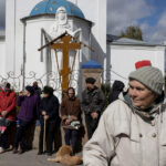 Ukrainian Church transformed by 4 years of war, Kyiv’s bishop says #Catholic – (OSV News) — Four years after Russia launched its full-scale invasion of Ukraine, the war has fundamentally reshaped the Catholic Church’s mission — turning parishes into shelters, priests into chaplains and charity into daily survival, Ukrainian bishop and leader of charity efforts told OSV News.
“Everything has changed. The country will never again be what it was before Feb. 24, 2022,” Auxiliary Bishop Oleksandr Yazlovetskiy of Kyiv-Zhytomyr, head of Caritas-Spes Ukraine, told OSV News in a conversation marking the anniversary.
As Ukraine enters a fifth year of war amid continued missile attacks, mounting casualties and growing international uncertainty about future aid, Church leaders say the conflict has brought the Church back to its most basic identity.
“The war revealed the essence of the Church — to be close to those who suffer,” the bishop said. “Not only to preach, but to be present: to listen, to support, to share fear and hope.”
Russia’s full-scale invasion triggered Europe’s largest humanitarian crisis since World War II.
Click here to subscribe to our weekly newsletter.
According to United Nations agencies, some 3.7 million Ukrainians remain internally displaced, while nearly 6.9 million continue to live as refugees across Europe and beyond. Entire communities have been uprooted multiple times as missile and drone attacks repeatedly damage homes, hospitals, schools and energy infrastructure — forcing reconstruction efforts to begin anew even before previous repairs are completed.
Nearly four years into the war, humanitarian needs remain massive, with millions still dependent on international aid for basic survival.
In that reality, pastoral ministry and humanitarian work have become inseparable.
“Since 2022, pastoral care cannot be separated from humanitarian service,” Bishop Yazlovetskiy told OSV News. Caritas organizations in Ukraine — both Roman Catholic Caritas-Spes Ukraine and the Ukrainian Greek Catholic Caritas Ukraine — rapidly evolved from modest social service groups into nationwide emergency networks.
“From small organizations of social assistance, Caritas became a powerful structure with centers across the country,” Bishop Yazlovetskiy said, crediting support from Caritas Europe, the global Caritas network and Church and governmental donors from across the globe.
“Unfortunately, help is already decreasing, while needs are not,” he said. “Mercy has become an everyday, urgent mission.”
The Church’s transformation is visible in moments of crisis. After Russian strikes destroyed parts of Ukraine’s energy system and cities were plunged into cold and darkness, Catholic parishes opened what were called “points of warmth and hope.”
“The Church fed people and kept them warm,” the bishop said.
War also reshaped relations among Christian communities. Pre-war disputes and competition between churches gave way to cooperation through the Ukrainian Council of Churches and Religious Organizations, representing the vast majority of believers in the country.
“The tragedy of war united us,” Kyiv’s bishop said. “All churches returned to their primary mission — helping the vulnerable both in word and in action.”
That visible service has changed how Ukrainians perceive the Church.
“Where the Church truly helps, trust grows,” Bishop Yazlovetskiy told OSV News. “The witness of love became more convincing than any words.”
He pointed especially to military chaplains serving alongside soldiers and in hospitals. Government approval allowing priests to serve officially with military units has brought clergy closer to frontline realities.
“In this way, the Church is also with its soldiers,” the bishop said.
International solidarity remains essential, particularly assistance from the United States.
“American aid is vital — humanitarian and military,” he said. “Americans should know that their support saves lives every day. Without this help, especially military assistance, we will not endure.” Delays in support quickly translate into loss of life, he added. “Every delay in aid is later seen in the growing number of funerals of our soldiers.”
At the same time, global spiritual solidarity continues to accompany Ukraine.
Catholic communities around the world marked the anniversary with prayer initiatives promoted by the Commission of the Bishops’ Conferences of the European Union, known as COMECE, and the Centesimus Annus Pro Pontifice Foundation, echoing repeated appeals from Pope Leo XIV for peace in Ukraine.
“Four years have passed since the beginning of the war against Ukraine,” Pope Leo said during his Angelus prayer Feb. 22. “My heartfelt thoughts remain focused on the tragic situation unfolding before the eyes of the whole world: so many victims, so many lives and families shattered, such immense destruction, such unspeakable suffering!”
Prayer gatherings were taking place in many countries, including Rome, where Cardinal Matteo Zuppi of Bologna will preside over prayer vigil of the Community of Sant’Egidio Feb. 24 at 8 p.m.
Such gestures, and prayer, Bishop Yazlovetskiy said, matter deeply.
“When we hear that the United States and European countries support us, it gives hope and strengthens people,” he said. “But when someone turns away — even one political statement — the burden of war suddenly becomes much heavier.”
Behind geopolitical debates stand deeply personal stories. The bishop recalled a widowed Catholic mother from his hometown who raised six children alone. Two of her sons have been killed in the war, while a third now fights at the front.
“Despite everything, she continues to come to church,” he said. “She writes poetry through her pain. People call her ‘a mother who cries in poems.’ Saints do not look at us only from icons — they live among us.”
Prayer in Ukraine today however reflects exhaustion more than triumph.
“People pray for a just peace, for soldiers, prisoners, the wounded and the dead,” the bishop said. “No one prays for victory. Ukrainians pray for peace — again and again, peace.”
For Bishop Yazlovetskiy, faith has not eliminated fear but has made endurance possible.
“God never shows us the entire length of the thorny road,” he told OSV News. “He lights only a few steps ahead, like a flashlight in the darkness. If people had known four years ago how long this war would last, despair would have been unbearable.”
Still, he insists hope remains stronger than despair.
“We believe love is stronger than hatred,” he said. “God is present even where darkness seems to reign. The greatest darkness today is in Ukraine — and we believe God is with us.”
Katarzyna Szalajko writes for OSV News from Warsaw, Poland. Ukrainian Church transformed by 4 years of war, Kyiv’s bishop says #Catholic – (OSV News) — Four years after Russia launched its full-scale invasion of Ukraine, the war has fundamentally reshaped the Catholic Church’s mission — turning parishes into shelters, priests into chaplains and charity into daily survival, Ukrainian bishop and leader of charity efforts told OSV News.
“Everything has changed. The country will never again be what it was before Feb. 24, 2022,” Auxiliary Bishop Oleksandr Yazlovetskiy of Kyiv-Zhytomyr, head of Caritas-Spes Ukraine, told OSV News in a conversation marking the anniversary.
As Ukraine enters a fifth year of war amid continued missile attacks, mounting casualties and growing international uncertainty about future aid, Church leaders say the conflict has brought the Church back to its most basic identity.
“The war revealed the essence of the Church — to be close to those who suffer,” the bishop said. “Not only to preach, but to be present: to listen, to support, to share fear and hope.”
Russia’s full-scale invasion triggered Europe’s largest humanitarian crisis since World War II.
Click here to subscribe to our weekly newsletter.
According to United Nations agencies, some 3.7 million Ukrainians remain internally displaced, while nearly 6.9 million continue to live as refugees across Europe and beyond. Entire communities have been uprooted multiple times as missile and drone attacks repeatedly damage homes, hospitals, schools and energy infrastructure — forcing reconstruction efforts to begin anew even before previous repairs are completed.
Nearly four years into the war, humanitarian needs remain massive, with millions still dependent on international aid for basic survival.
In that reality, pastoral ministry and humanitarian work have become inseparable.
“Since 2022, pastoral care cannot be separated from humanitarian service,” Bishop Yazlovetskiy told OSV News. Caritas organizations in Ukraine — both Roman Catholic Caritas-Spes Ukraine and the Ukrainian Greek Catholic Caritas Ukraine — rapidly evolved from modest social service groups into nationwide emergency networks.
“From small organizations of social assistance, Caritas became a powerful structure with centers across the country,” Bishop Yazlovetskiy said, crediting support from Caritas Europe, the global Caritas network and Church and governmental donors from across the globe.
“Unfortunately, help is already decreasing, while needs are not,” he said. “Mercy has become an everyday, urgent mission.”
The Church’s transformation is visible in moments of crisis. After Russian strikes destroyed parts of Ukraine’s energy system and cities were plunged into cold and darkness, Catholic parishes opened what were called “points of warmth and hope.”
“The Church fed people and kept them warm,” the bishop said.
War also reshaped relations among Christian communities. Pre-war disputes and competition between churches gave way to cooperation through the Ukrainian Council of Churches and Religious Organizations, representing the vast majority of believers in the country.
“The tragedy of war united us,” Kyiv’s bishop said. “All churches returned to their primary mission — helping the vulnerable both in word and in action.”
That visible service has changed how Ukrainians perceive the Church.
“Where the Church truly helps, trust grows,” Bishop Yazlovetskiy told OSV News. “The witness of love became more convincing than any words.”
He pointed especially to military chaplains serving alongside soldiers and in hospitals. Government approval allowing priests to serve officially with military units has brought clergy closer to frontline realities.
“In this way, the Church is also with its soldiers,” the bishop said.
International solidarity remains essential, particularly assistance from the United States.
“American aid is vital — humanitarian and military,” he said. “Americans should know that their support saves lives every day. Without this help, especially military assistance, we will not endure.” Delays in support quickly translate into loss of life, he added. “Every delay in aid is later seen in the growing number of funerals of our soldiers.”
At the same time, global spiritual solidarity continues to accompany Ukraine.
Catholic communities around the world marked the anniversary with prayer initiatives promoted by the Commission of the Bishops’ Conferences of the European Union, known as COMECE, and the Centesimus Annus Pro Pontifice Foundation, echoing repeated appeals from Pope Leo XIV for peace in Ukraine.
“Four years have passed since the beginning of the war against Ukraine,” Pope Leo said during his Angelus prayer Feb. 22. “My heartfelt thoughts remain focused on the tragic situation unfolding before the eyes of the whole world: so many victims, so many lives and families shattered, such immense destruction, such unspeakable suffering!”
Prayer gatherings were taking place in many countries, including Rome, where Cardinal Matteo Zuppi of Bologna will preside over prayer vigil of the Community of Sant’Egidio Feb. 24 at 8 p.m.
Such gestures, and prayer, Bishop Yazlovetskiy said, matter deeply.
“When we hear that the United States and European countries support us, it gives hope and strengthens people,” he said. “But when someone turns away — even one political statement — the burden of war suddenly becomes much heavier.”
Behind geopolitical debates stand deeply personal stories. The bishop recalled a widowed Catholic mother from his hometown who raised six children alone. Two of her sons have been killed in the war, while a third now fights at the front.
“Despite everything, she continues to come to church,” he said. “She writes poetry through her pain. People call her ‘a mother who cries in poems.’ Saints do not look at us only from icons — they live among us.”
Prayer in Ukraine today however reflects exhaustion more than triumph.
“People pray for a just peace, for soldiers, prisoners, the wounded and the dead,” the bishop said. “No one prays for victory. Ukrainians pray for peace — again and again, peace.”
For Bishop Yazlovetskiy, faith has not eliminated fear but has made endurance possible.
“God never shows us the entire length of the thorny road,” he told OSV News. “He lights only a few steps ahead, like a flashlight in the darkness. If people had known four years ago how long this war would last, despair would have been unbearable.”
Still, he insists hope remains stronger than despair.
“We believe love is stronger than hatred,” he said. “God is present even where darkness seems to reign. The greatest darkness today is in Ukraine — and we believe God is with us.”
Katarzyna Szalajko writes for OSV News from Warsaw, Poland.