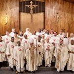 Alaskan Chrism Masses: bishops and priests unite with joy #Catholic – In most parts of the world, Catholic dioceses celebrate the Chrism Mass during Holy Week as they prepare for the Sacred Triduum. However, in Alaska, this annual liturgy typically follows a different schedule.
The Church in this vast state, covering 665,384 square miles, usually holds Chrism Masses a few weeks before Holy Week. That’s to enable the many missionary priests, who travel long distances to serve their remote faith communities, to receive the sacred oils, which are consecrated during the Mass, or to have them mailed to their parishes by around Eastertime. The packages contain the Oil of the Sick, the Oil of Catechumens, and the Oil of Chrism, which priests use throughout the year.
Father Kamil Kiszka, moderator of St. Joseph Parish in Kotlik and Holy Family in Mertarvik, serves remote southwestern Alaska villages with populations ranging from 200 to 750. He is also a priest of the Paterson Diocese in New Jersey.

Click here to subscribe to our weekly newsletter.

This year, Father Kiszka had a satisfying spiritual moment during a noteworthy Chrism Mass on March 12, following the recent Alaska Priestly Convocation. Every year, priests ministering in Alaska gather for three days of priestly fraternity and spiritual development at the Cathedral of Our Lady of Guadalupe in Anchorage, in the Archdiocese of Anchorage-Juneau.
At the end of their convocation, priests from Anchorage-Juneau celebrate the Chrism Mass with Archbishop Andrew Bellisario, while priests from the Diocese of Fairbanks travel to Fairbanks to celebrate the Mass with Bishop Steven Maekawa, O.P.
“It was wonderful to be in the presence of the two bishops and my brother priests for the time of convocation. I was even happier to celebrate the Chrism Mass in Fairbanks with the diocesan priests. During the Mass, we receive the sacred oils from the bishop, which unite us priests with the bishop in our ministry. It’s great to have a sense of spiritual support and unity,” said Father Kiszka. “The oils are a sign of the grace of God, which I pass on to the people as a priest to strengthen them spiritually.”
Father Kiszka attended an “Oil Mass” last year in Bethel, which he said was unique but lacked the spiritual and fraternal elements of the Chrism Mass, where the bishop consecrates the holy oils and priests renew their promises.
After the Chrism Mass in Fairbanks, large bottles of the sacred oils were taken by one of the priests to another city, Bethel. There, the oils were redistributed at a local church into many smaller bottles, which were sent to some remote parishes. Father Kiszka was able to pick up the set of oils for his parish in Kotlik, located on the Yukon-Kuskokwim Delta near the coast.
However, the set for his parish in Mertarvik has to wait for his next trip to visit the village.
Unpredictable winter flights make airmail deliveries of the oils difficult. Oils are mailed to parishes without resident priests. In some cases, one priest serves multiple parishes, so oils are mailed ahead when he cannot visit all of them before Easter.
The considerable logistics of distributing and mailing the holy oils only hint at the difficulties faced by mission priests living and ministering in Alaska’s “bush” country. Father Kiszka started his full-time missionary work in Alaska in 2024 and is expected to return to Paterson this July.
The Polish-born priest travels by snowmobile, boat, and four-wheel vehicle. Sometimes he faces sub-zero temperatures. He often lacks access to running water, showers, restrooms, phone service, the Internet, transportation, or food supplies.
To reach Mertarvik, Father Kiszka takes three planes. He sleeps on the floor in the local school to celebrate Mass for parishioners the next day. He enjoys hearing confessions in Yugtun, the native language of the Yupik Indigenous peoples. He also enjoys singing the “Our Father” in Yugtun during Mass.
This winter has been the toughest in Alaska since the 1990s. Illustrating the difficulties, pipes broke in his church in Kotlik, and the city of North Pole, near Fairbanks, experienced extreme temperatures of -66 degrees below zero, according to Father Kiszka.
“Missionary priests like me are getting a sense that there is a wider Church in the world. It’s challenging, but with God’s grace, I see that I’m doing something here in Alaska that will continue: the building up of the Church,” Father Kiszka said. “I’m bringing God with me to the native people I have been serving. I want to help make their faith more alive than I have in myself and my priesthood.”
&nbsp;