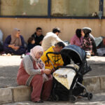 As humanitarian crisis looms in Lebanon, Mideast Christians face uncertain future #Catholic – (OSV News) — Lebanon has been gripped by panic and internal displacement crisis following Israeli evacuation orders as part of the U.S. and Israel–Iran war, with the country coming to reflect the growing pressure on Middle Eastern Christians, raising fears the conflict could force many to leave the region permanently.
Heavy Israeli airstrikes on Iran-backed Hezbollah and ongoing clashes, along with mass evacuation orders, have forced Christians across Lebanon to flee, leaving many homeless. Hezbollah joined Iran in the fighting despite a prohibition from the Lebanese government.
According to the United Nations, nearly 700,000 people have been displaced from southern Lebanon, south Beirut, and the Bekaa Valley as they seek refuge in Beirut. The violence has also killed more than 80 children.
Lebanese Prime Minister Nawaf Salam warned on March 6 of a “looming humanitarian disaster” after Israel ordered mass evacuations March 5 in south Lebanon and Beirut’s southern suburbs. He said Lebanon has been dragged into a devastating war it did not choose.

Click here to subscribe to our weekly newsletter.

The economically stricken country is still recovering from the last war between Israel and Hezbollah ending in 2024.
Michael Constatin, CNEWA Pontifical Mission’s regional director for Lebanon, Syria and Egypt, told OSV News that his organization is ministering to Christians who remain in the south, caught in the crosshairs between the Israeli military and Hezbollah, and to those who are now displaced in the Beirut area. It also helps people of other faiths.
Speaking about Christians in the southern areas of Marjayoun, Bint Jbeil and Al-Mashhad, Constantin said: “They have all decided to stay to protect their homes. But those in Al-Mashhad were forced to evacuate their homes on March 10 and come to Beirut. Very few remain in that village. These people could be killed.”
“In Rmaich in Bint Jbail, there are 1,300 Christian families who have taken in another 300 Christian families displaced from other villages. They are surrounded by the Israeli army and by shelling. The village situation is very harsh,” he said, underscoring the danger.
CNEWA is providing this area and Marjayoun with fuel to empower water purification and generate power for cellphones and the internet to be able to communicate.
“People are afraid for attacks on these Christian villages,” Constatin explained, recounting at least three violent incidents involving Catholic clerics’ families in the south, including the killing of Lebanese Maronite Catholic priest Father Pierre al-Rahi in Qlayaa, Marjayoun, by Israeli artillery tank fire on March 9. Father al-Rahi refused to leave the village, protecting his community.
“This has made Christians very anxious, not knowing whether to stay or not,” the CNEWA head said, adding that this puts more pressure on Christians caught between Hezbollah militants and Israeli forces.
“If they leave immediately, some Hezbollah members will hide in their villages and their homes, and all the villages will be completely destroyed.”
Meanwhile, CNEWA is aiding the displaced in Beirut with food coupons. Some 750 Christian families have now fled there. However, Constantin points out that they could soon be joined by an additional 3,000 more Christian families escaping fighting in the south as the humanitarian crisis grows.
Iraqi Christians are also coming under growing pressure as a result of the U.S. and Israel-Iran war. An explosive drone strike on the Chaldean Catholic complex in Ankawa, outside of Irbil took place on March 4, luckily damaging only the chapel and a block of apartments. “We thank God for the safety of everyone,” Chaldean Catholic Archbishop Bashar M. Warda told OSV News.
“When war erupts in the Middle East, we face another erosion, fast or slow. Do we stay? Do our children have a future?” Archbishop Warda further commented to the pontifical charity Aid to the Church in Need.
A U.S. military base near Irbil Airport has come under multiple drone attacks, while the United Arab Emirates consulate and a hotel frequented by foreigners in Irbil were also attacked by drones.
Father Emanuel Youkhana, a priest, or archimandrite, of the Assyrian Church of the East, who aids Christians and other Iraqi minorities in northern Iraq, told OSV News that the “situation in Irbil is escalating because of the American logistic base attached to the airport and the American consul in Irbil.”
“The Christian town of Ankawa is close to the airport and near the area of targeting. So, the church complex and the hotel were vulnerable to these attacks. North of Irbil is the American military base, Harir Air Base, and in the area are the camps of Iranian Kurdish opposition groups which especially became targets,” Father Youkhana explained.
“Both Iran and the Iranian-backed Shiite militias of Iraq carry out these attacks,” he said. “This is the concern that it can form the basis for internal conflict in the country.”
Father Youkhana said there are fears that Christians will once again face displacement. They were forced to flee their ancestral homeland of the Nineveh Plain in 2014 — after the brutal Islamic State group invasion — and the latest war evokes painful memories and trauma.
“Should the violence escalate, there are fears that this could lead to the displacement of Christians in Ankawa to seek refuge further north. And further south in the Nineveh Plain from where these Iran-backed militias are now operating.”
If Israel and/or the U.S. were to attack this area, once Iraq’s Christian heartland, “Christians would be forced to flee north to Dohuk,” the priest explained.
“In crisis times, vulnerable communities, like Christians, suffer more and feel greater uncertainty,” said Father Youkhana.
Dale Gavlak writes for OSV News from Amman, Jordan.