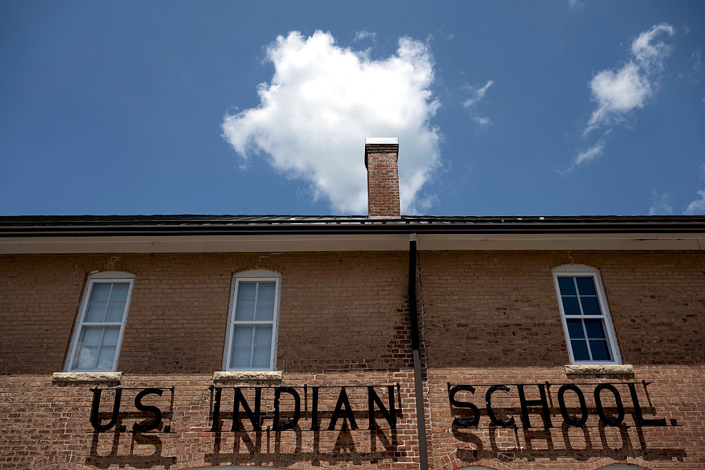 Bishops urge action on bill to examine Indian boarding school policies – #Catholic – Four bishops have written to Congress urging them to investigate the federal Indian boarding school system.Archbishop Shelton Fabre of the Archdiocese of Louisville, Kentucky, with Bishops John Folda of the Diocese of Fargo, North Dakota; Robert Brennan of the Diocese of Brooklyn, New York; and Barry Knestout of the Diocese of Richmond, Virginia, sent a letter to lawmakers in support of a bill (HR 7325) that would establish a commission to investigate, document, and report on the history and lasting impacts of Indian boarding schools.Christian missionaries sought to educate Native American children to initiate them into the Christian faith through catechesis and spiritual formation, but the schools, which were overseen by the federal government in the mid-19th century, involved many hardships for Native American populations. The United States Conference of Catholic Bishops has acknowledged the Church’s involvement in this history.“The forced removal of children from their tribal lands and communities as part of federal boarding school policies was a moral failure that disregarded the unique culture and dignity of Indigenous peoples,” the four bishops wrote to bill sponsor Rep. Tom Cole, R-Oklahoma, and Rep. Sharice Davids, D-Kansas. “Accounts from this era illustrate lasting trauma among those who were involuntarily brought to these schools. The pain from the Native American boarding school era continues to echo today.”The four bishops addressed the same letter to Sen. Lisa Murkowski, R-Alaska, and Sen. Brian Schatz, D-Hawaii.Sponsored by Murkowski, the Senate’s identical version of the bill (SB 761) would create a commission to investigate the impacts and ongoing effects of the Indian Boarding School Policies and develop ways to protect unmarked graves and accompanying land protections. The bill also would support repatriation and identify the tribal nations from which children were taken and put an end to the removal of American Indian, Alaska Native, and Native Hawaiian children from their families and tribal communities by state social service departments, foster care agencies, and adoption agencies.The bishops urged creation of a Truth and Healing Commission to acknowledge the moral failures that harmed Indigenous children and communities and promote accountability. Under the bill, the commission would work toward reconciliation through a cooperative process involving government and religious institutions.No hearings have been set on the legislation in the House or Senate.The bishops’ letter said “the Catholic Church in the United States remains committed to transparency, to listening, and to humility. We remain dedicated to working with Native communities, government actors, and other religious traditions in efforts to bring about authentic healing and reconciliation. As one means of promoting this, we urge the House to favorably advance this legislation.”Fabre serves as chair of the USCCB Committee on Domestic Justice and Human Development; Folda is chair of the Subcommittee on Native American Affairs; Brennan is chair of the Committee on Cultural Diversity in the Church; and Knestout is chair of the Committee on the Protection of Children and Young People.