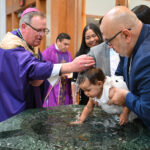 Joyful moment as Bishop baptizes infant in Pompton Plains #Catholic - Bishop Kevin J. Sweeney on March 8 visited Our Lady of Good Counsel (OLGC) Parish in Pompton Plains, N.J., to celebrate a Spanish Mass. He also performed a baptism of an infant, Sara Restrepo Gonzalez.
Father Darwin Lastra, OLGC pastor, and Father Yohan A. Serrano, spiritual director of the Hermandad Emmaus and Sussex County Hispanic community chaplain who lives at the parish, concelebrated the Mass with Bishop Sweeney.

Click here to subscribe to our weekly newsletter.

BEACON PHOTOS | JOE GIGLI
 [See image gallery at beaconnj.org] &nbsp;